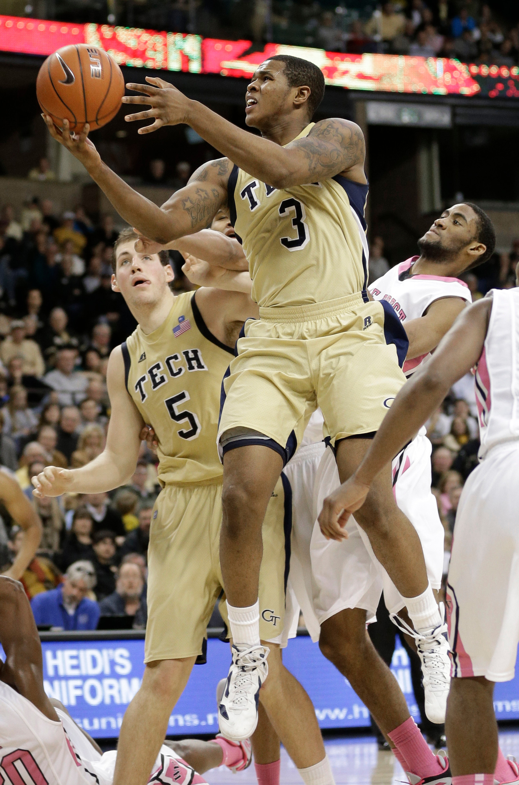 Georgia Tech's Marcus Georges-Hunt (3) drives to the basket against Wake Forest during the second half6. (AP Photo/Chuck Burton)