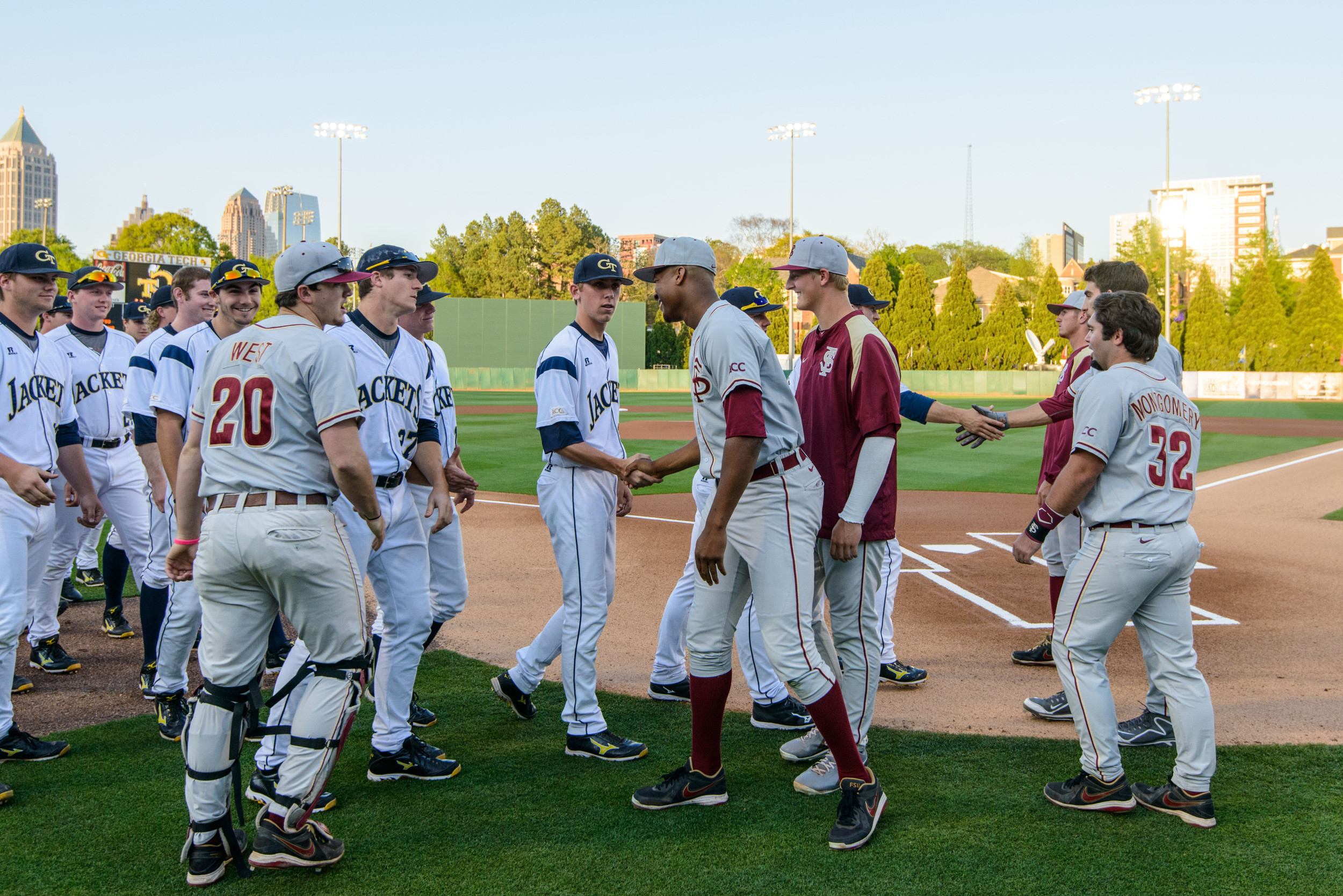 Yellow Jacket and Seminole players meet for the ACC Sportsmanship handshake