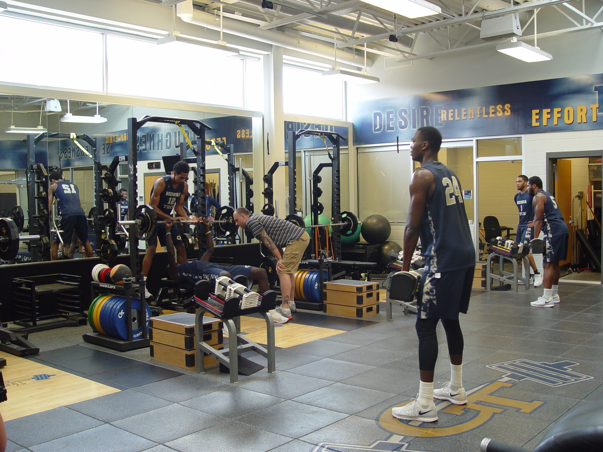 Player development coach Dan Taylor takes the Georgia Tech men's basketball team through a workout on June 16, 2016 in the Zelnak Center weight room.