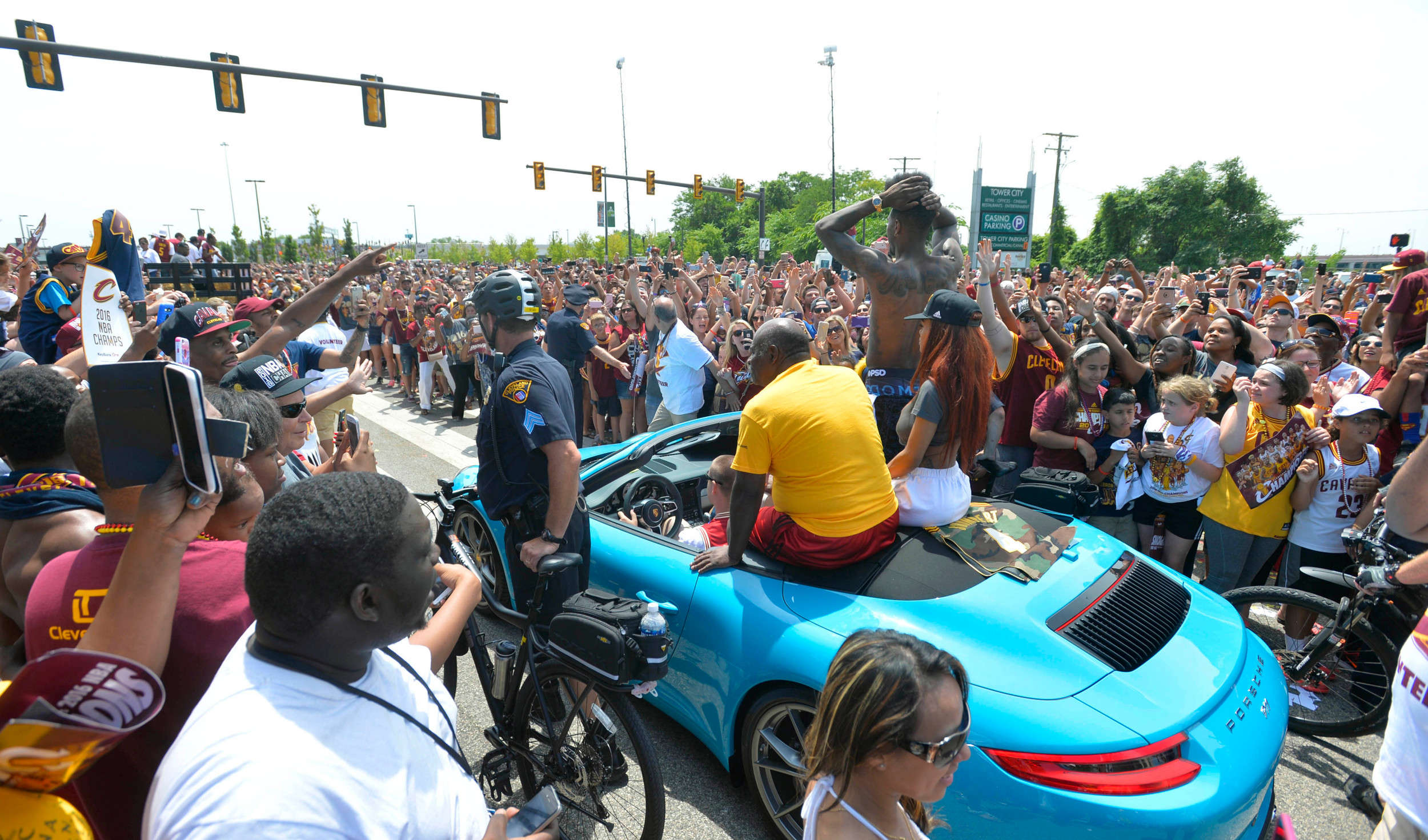 Cleveland Cavaliers guard Iman Shumpert rides in a convertible during the NBA championship parade in downtown Cleveland. Credit: David Richard-USA TODAY Sports