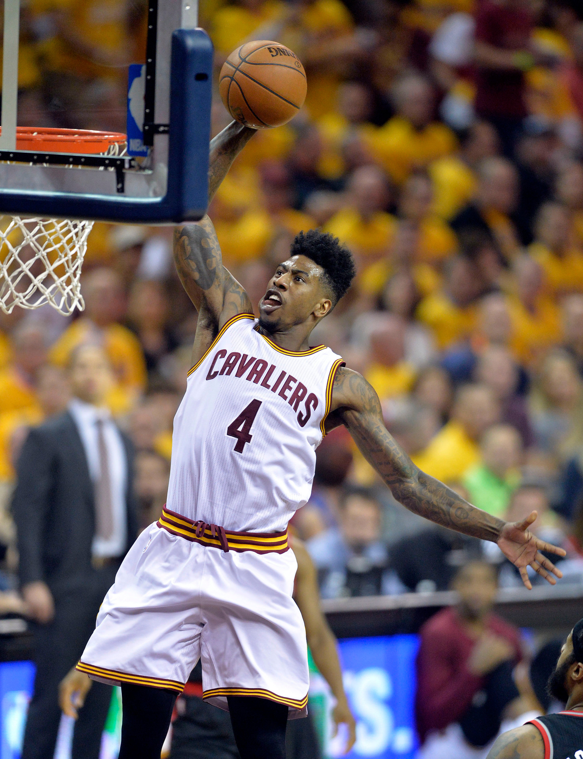 May 17, 2016; Cleveland, OH, USA; Cleveland Cavaliers guard Iman Shumpert (4) dunks against the Toronto Raptors in game one of the Eastern Conference Finals. Credit: David Richard-USA TODAY Sports