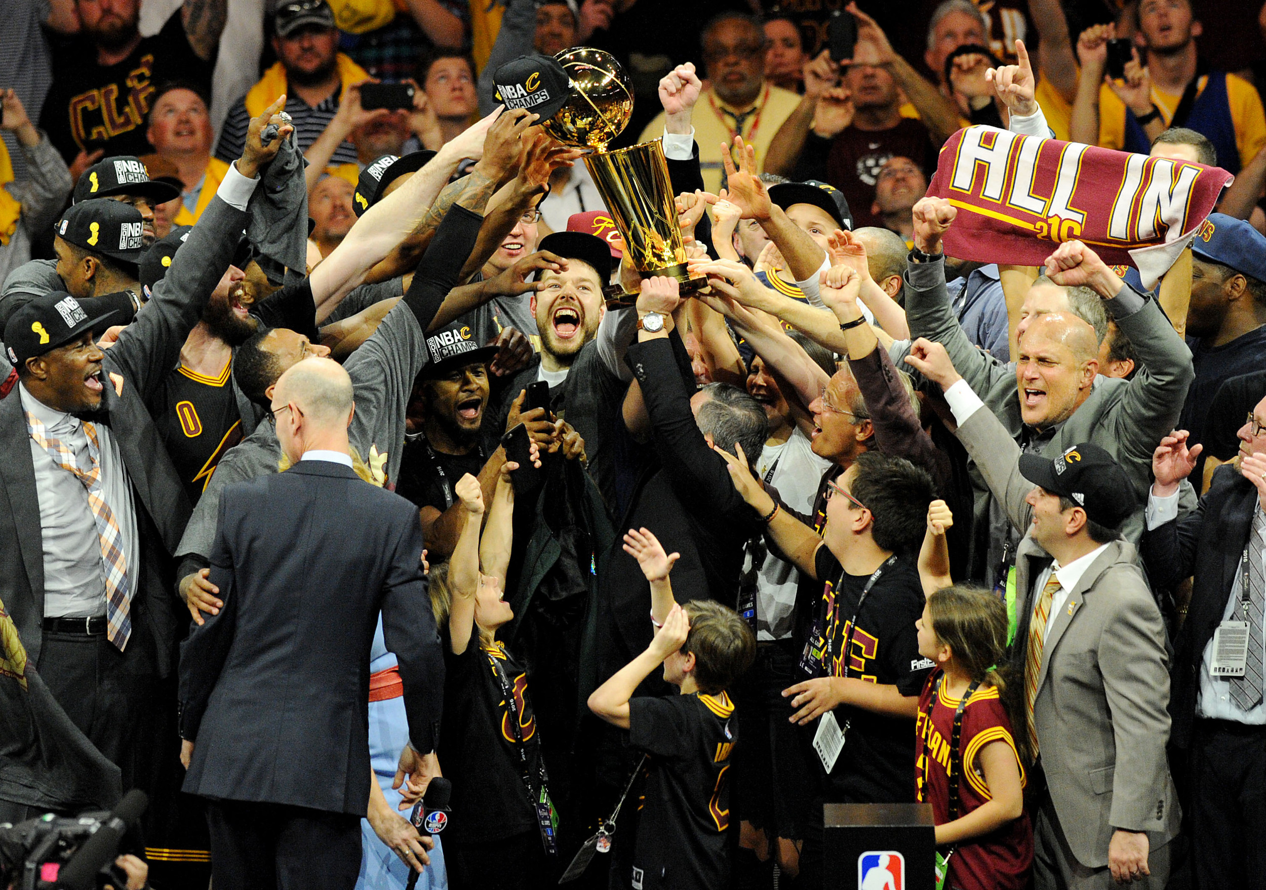 Jun 19, 2016; Oakland, CA, USA; The Cleveland Cavaliers celebrate with the Larry O'Brien Championship Trophy after beating the Golden State Warriors in game seven of the NBA Finals. Credit: Gary A. Vasquez-USA TODAY Sports