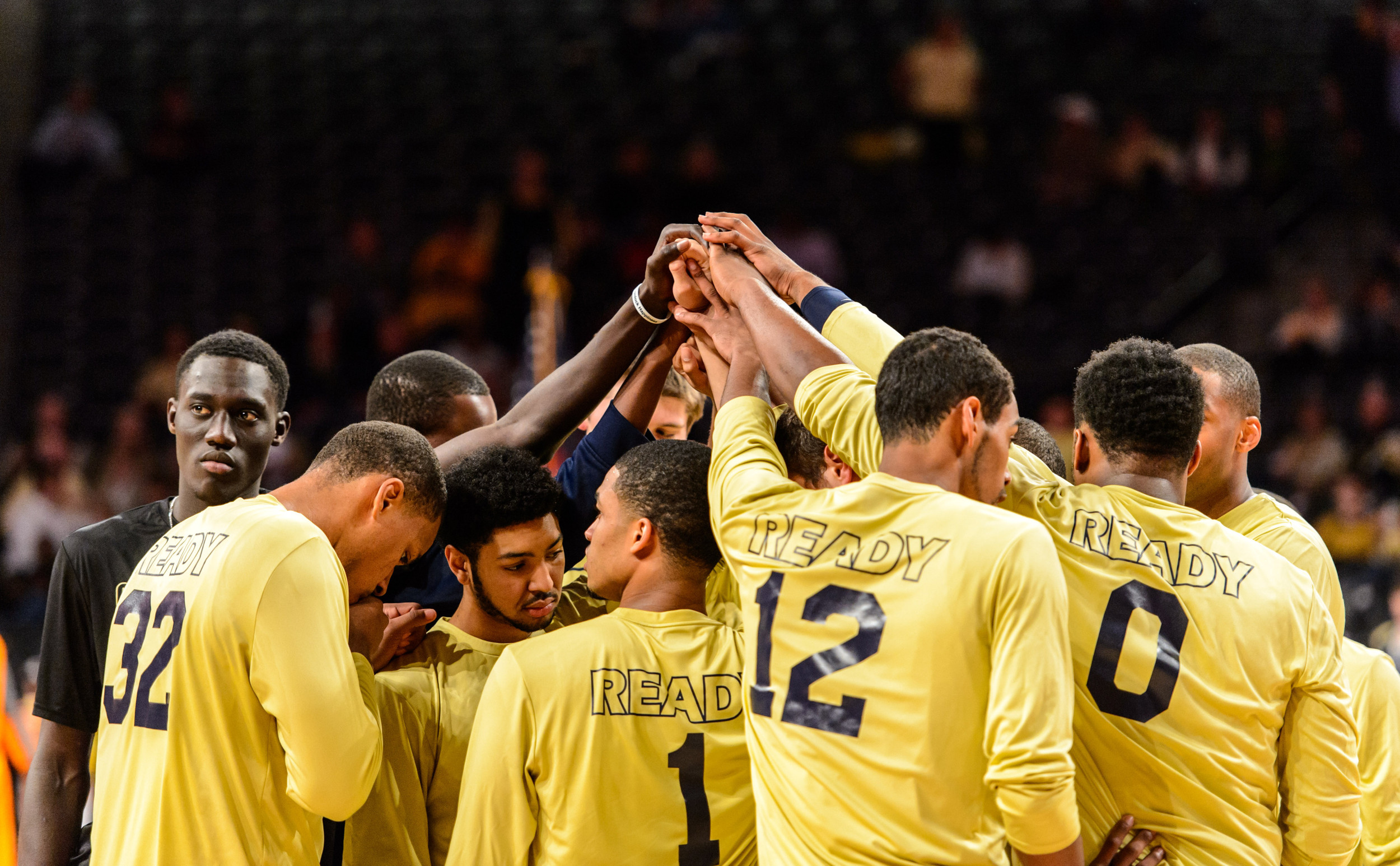 Team huddle prior to the start of the game