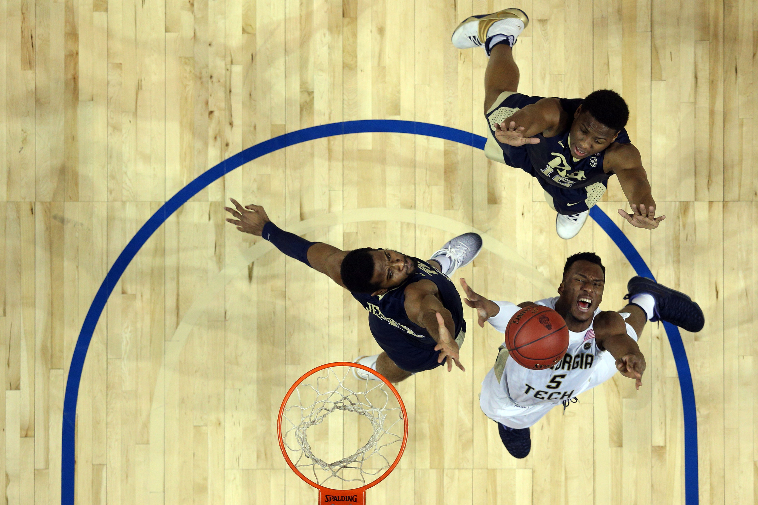 Guard Josh Okogie and Pittsburgh Panthers forward Sheldon Jeter fight for a rebound in front of Pittsburgh Panthers guard Chris Jones during the first half of an ACC Conference Tournament game at Barclays Center. Credit: Brad Penner-USA TODAY Sports