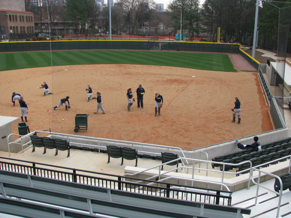 Softball team practices in its new stadium for the first time.