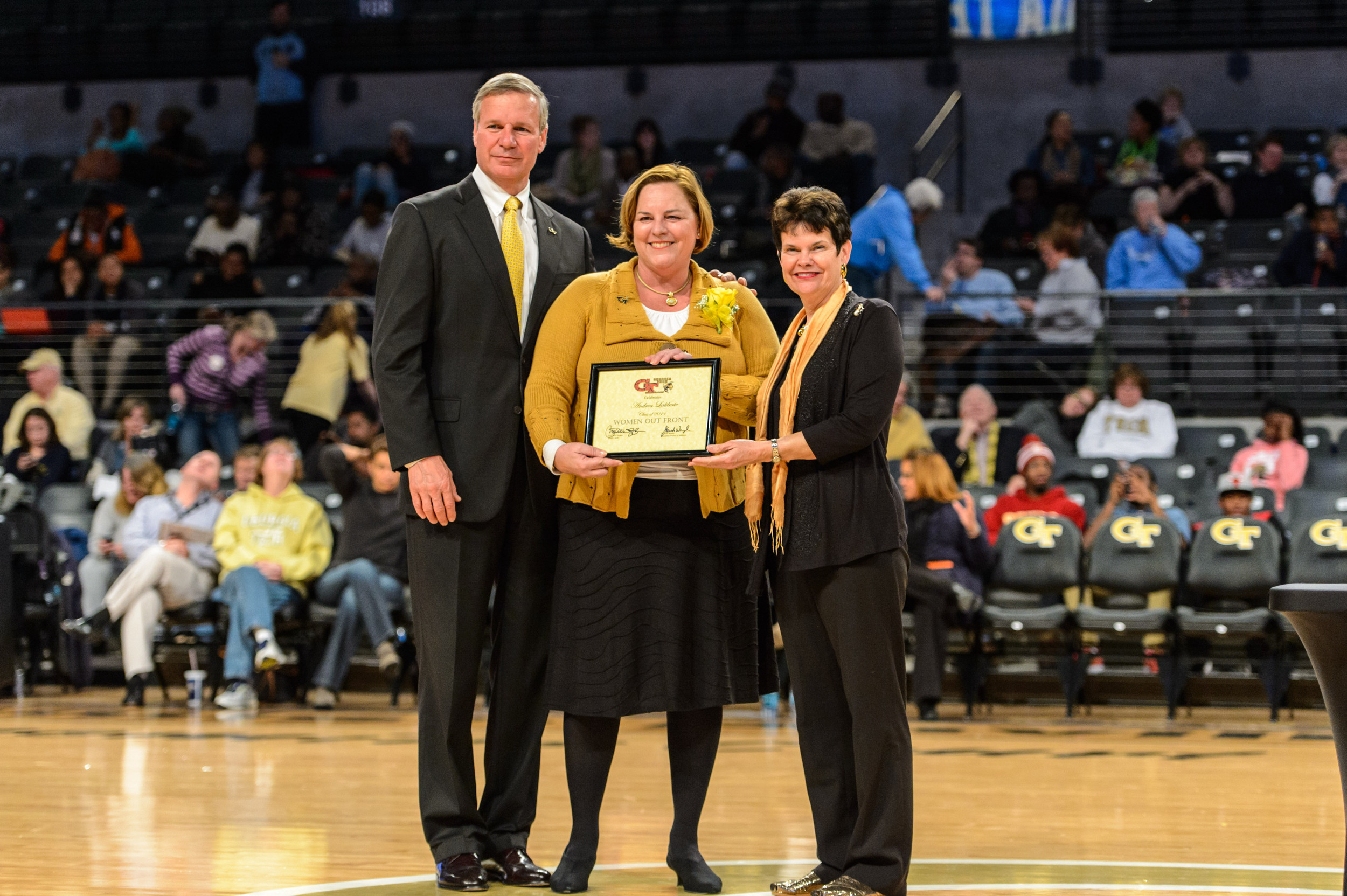 President Bud Peterson and his wife, Val, present the Class of 2014 for Women Out Front