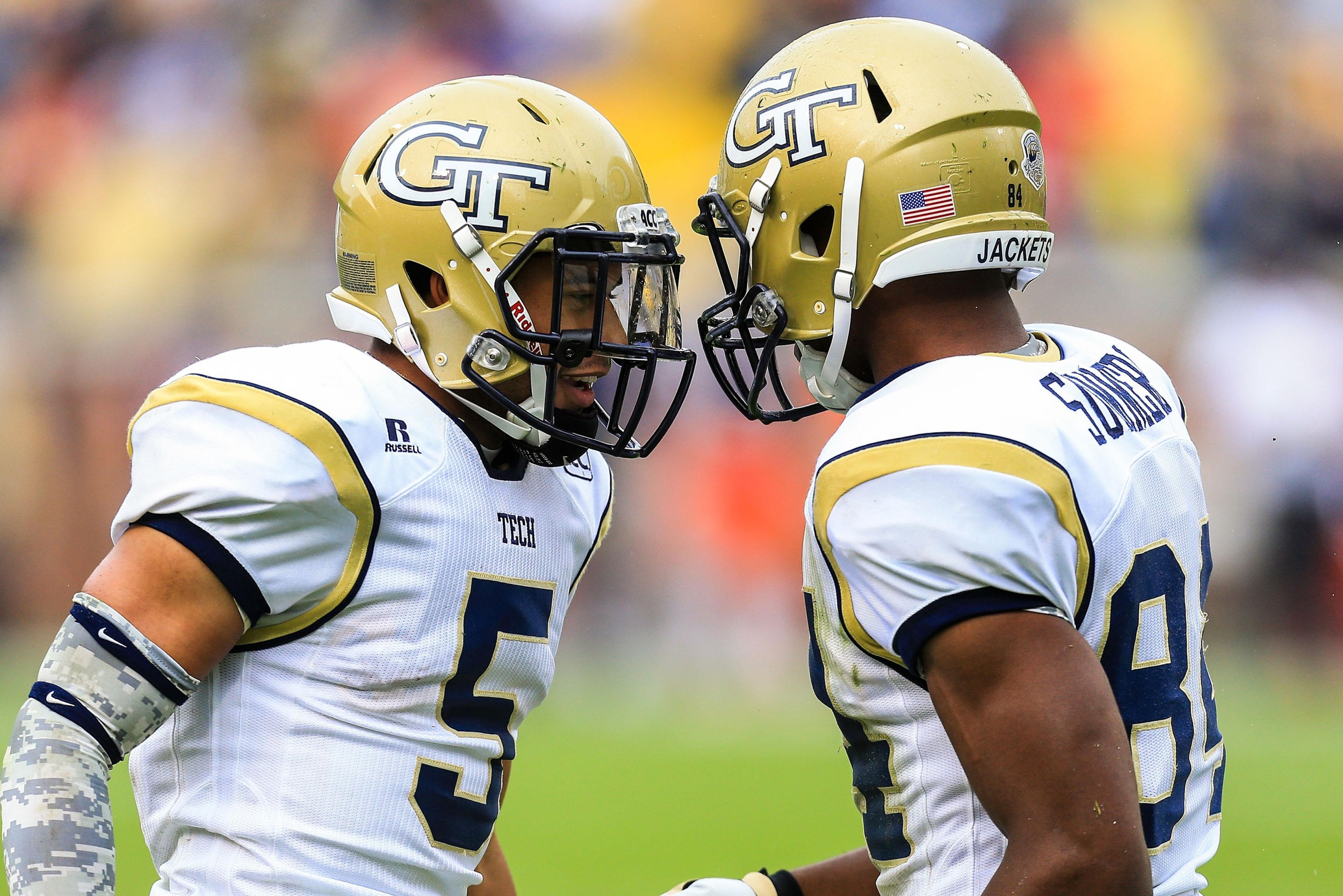 Jay Finch (50) celebrates a touchdown with wide receiver Micheal Summers (84). Mandatory Credit: Daniel Shirey-USA TODAY Sports