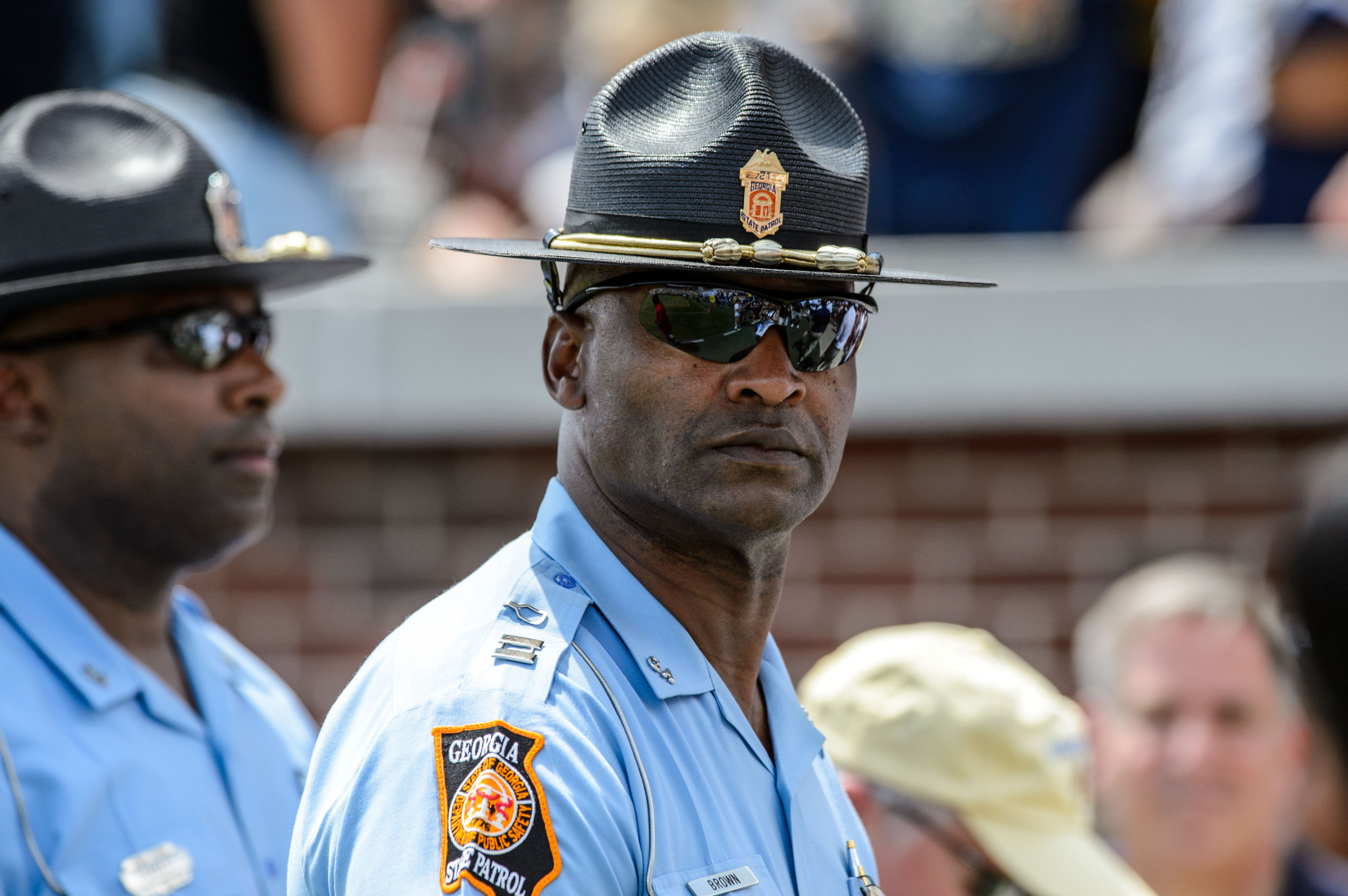 Georgia State Trooper and former Yellow Jacket safety Sammy Brown surveys the crowd