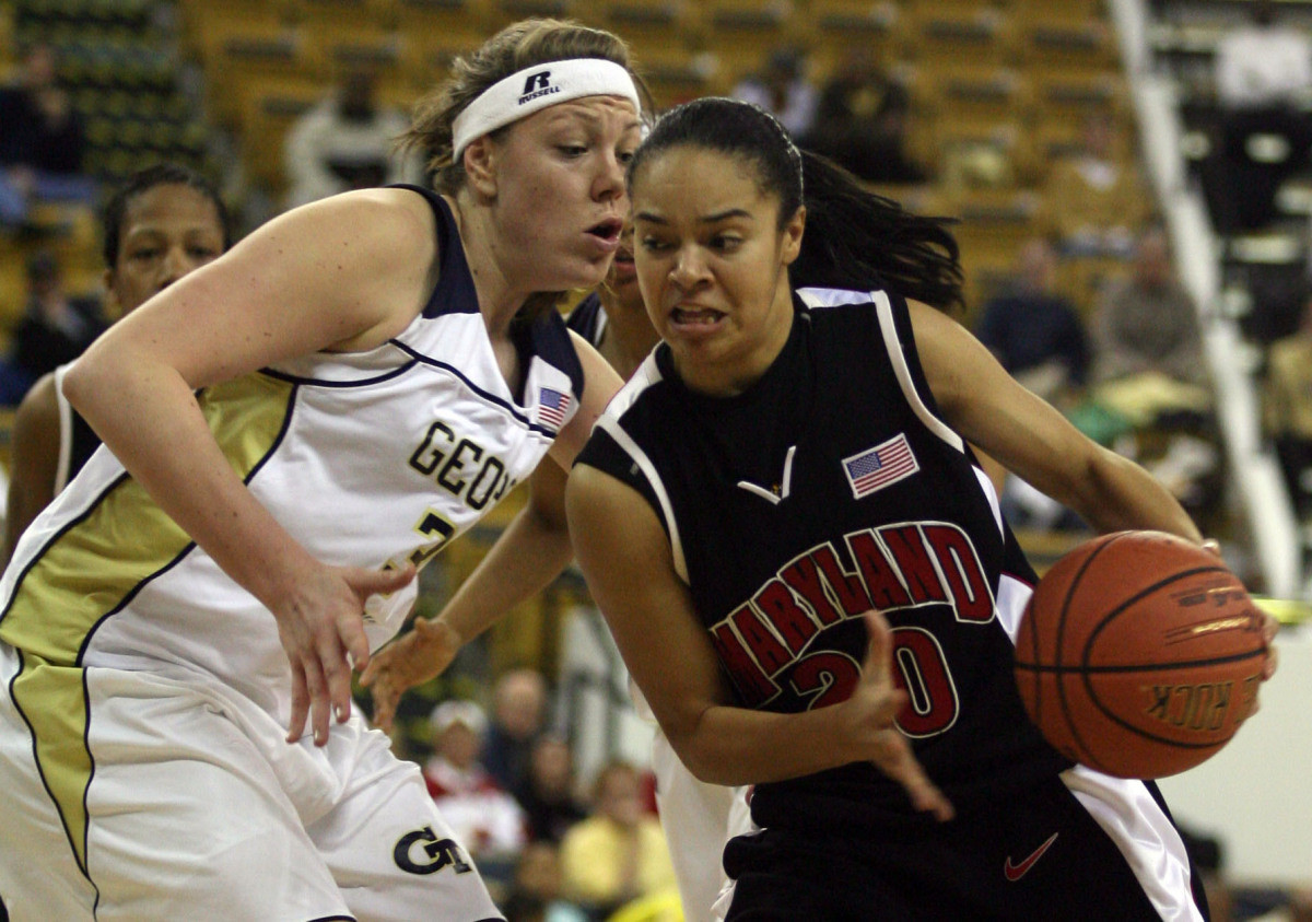 Georgia Tech's Brigitte Ardossi, left, plays heavy defense as Maryland's Kristi Tolliver drives to the basket during their basketball game Thursday, Feb. 1, 2007, in Atlanta. Georgia Tech beat No. 4 Maryland 77-72.(AP Photo/Atlanta Journal-Constitution, Mikki K. Harris)