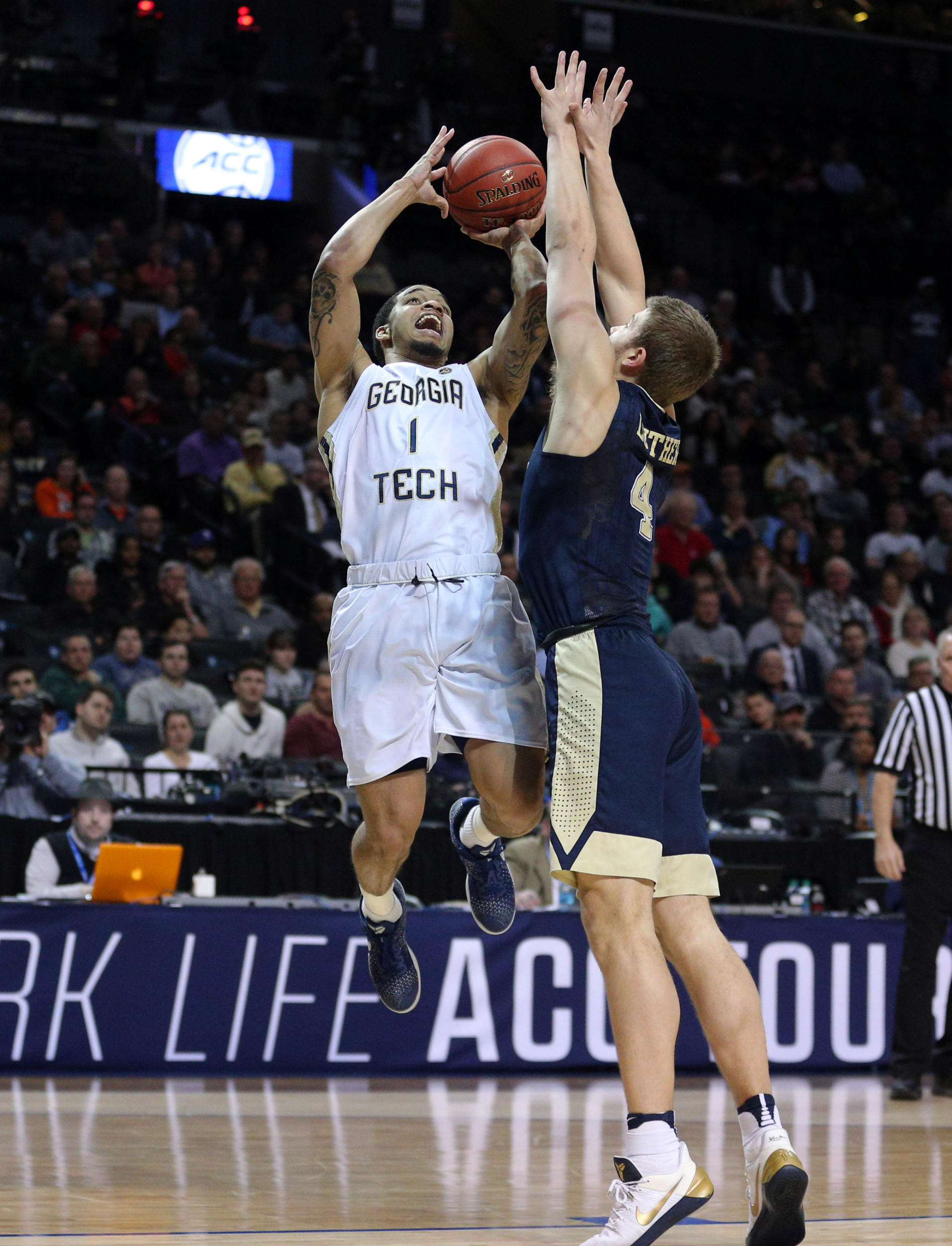Guard Tadric Jackson shoots past Pittsburgh Panthers forward Ryan Luther during the first half of an ACC Conference Tournament game at Barclays Center. Credit: Brad Penner-USA TODAY Sports