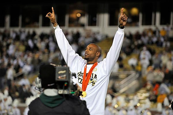 2008 Olympic gold medalist Angelo Taylor was honored at halftime. (Photo by Lenseffects)