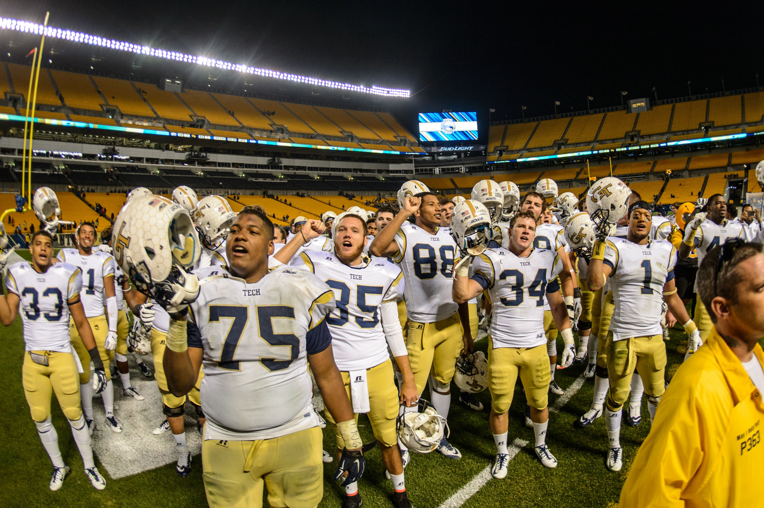 The team sings the Ramblin' Wreck with the fans after the win