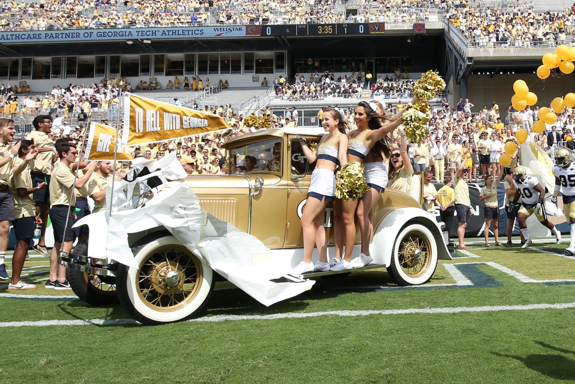 The Georgia Tech Yellow Jackets Ramblin' Wreck drives onto the field before the Jackets' game against the Vanderbilt Commodores at Bobby Dodd Stadium. Jason Getz-USA TODAY Sports