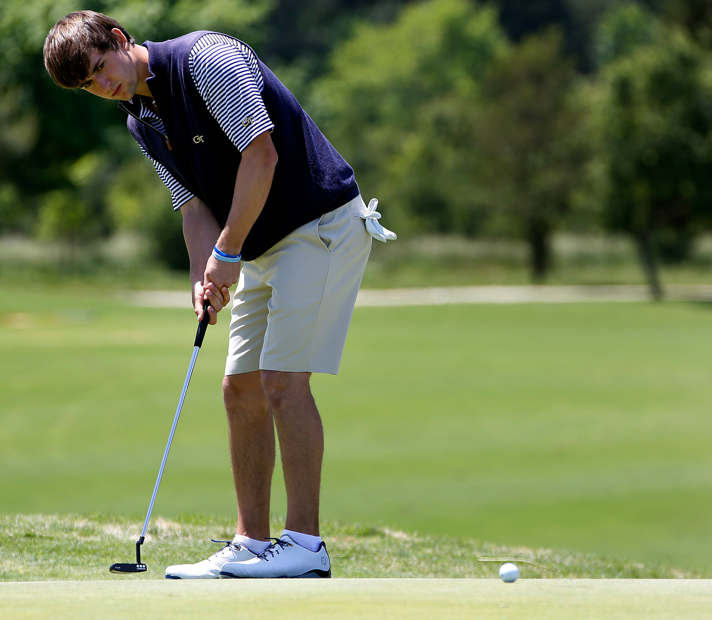Ollie Schniederjans attempts a putt Saturday at the NCAA Raleigh Regional