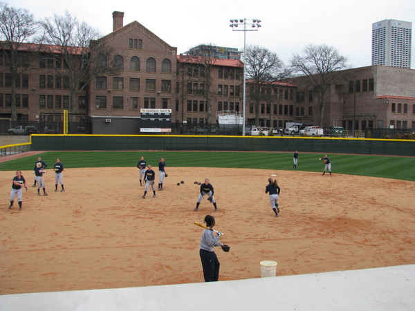 Softball team practices in its new stadium for the first time.