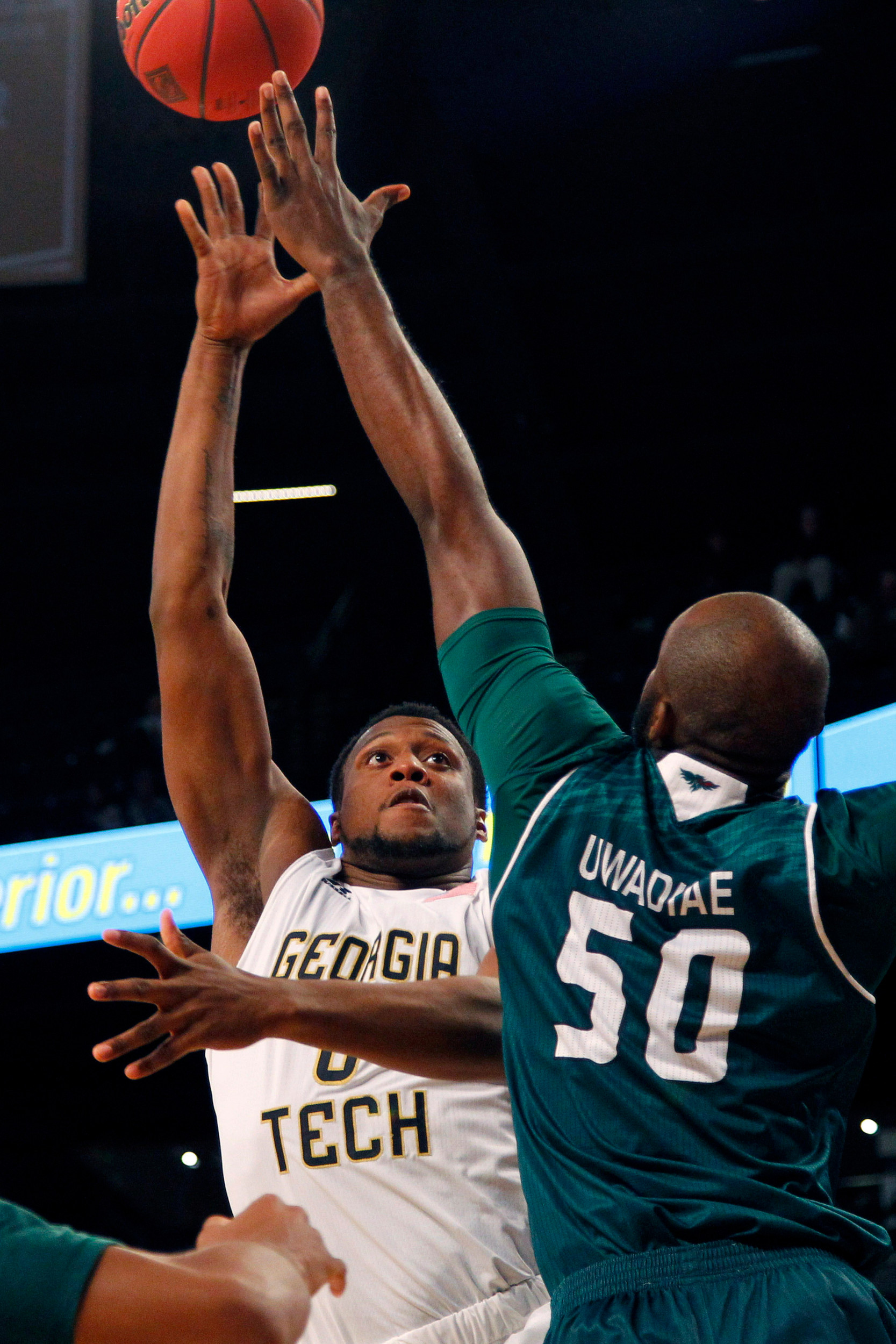 Yellow Jackets forward Charles Mitchell shoots the ball over Green Bay Phoenix forward Henry Uwadiae in the first half at McCamish Pavilion. Credit: Brett Davis-USA TODAY Sports