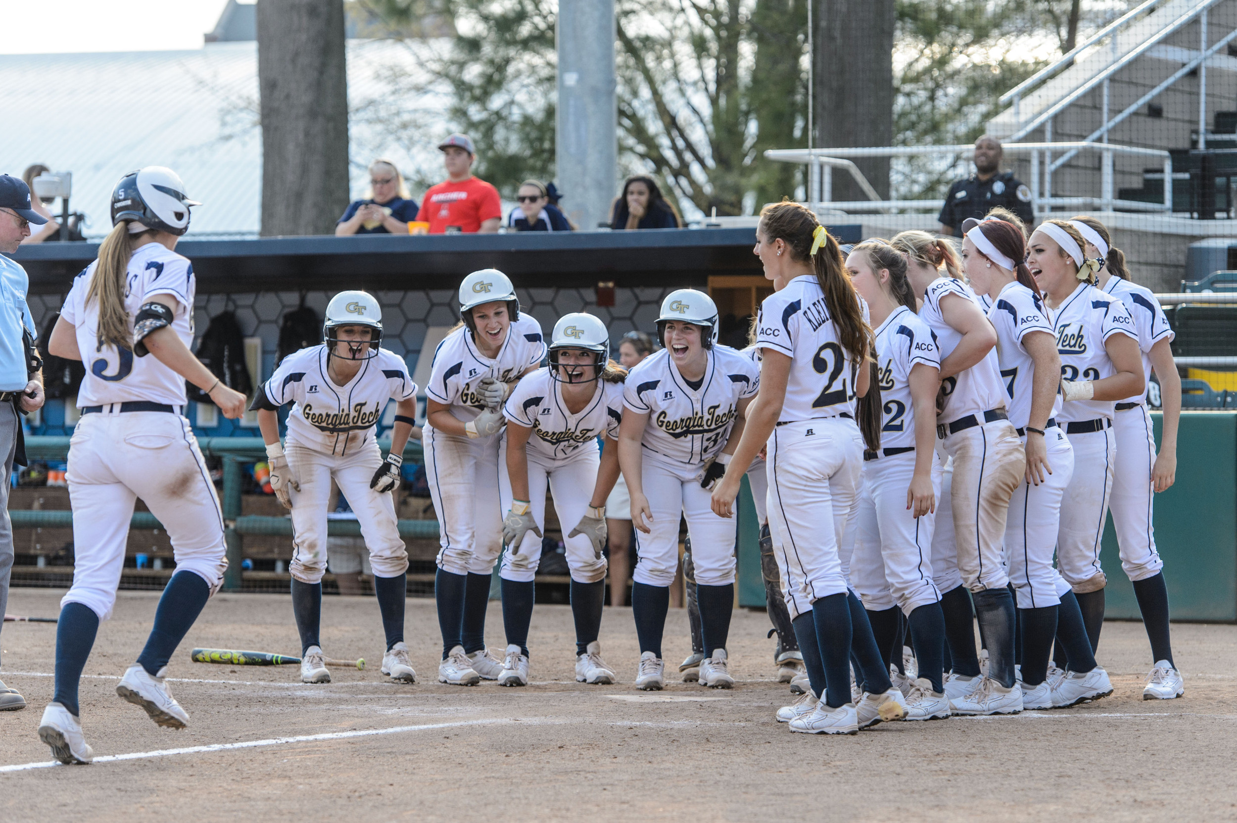 The team celebrates Ashley Thomas' (5) home run