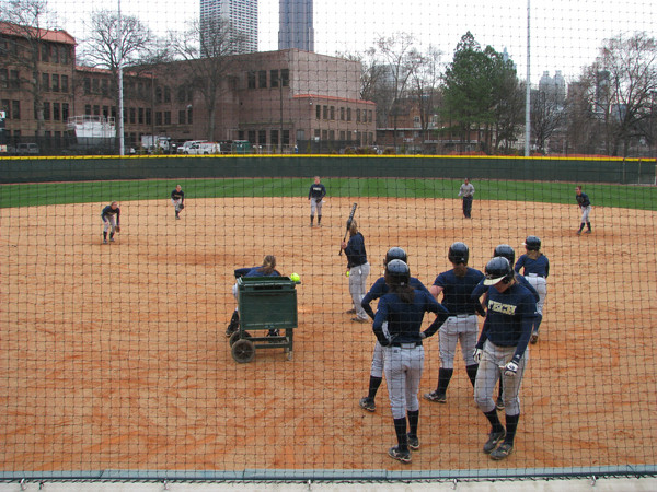 Softball team practices in its new stadium for the first time.