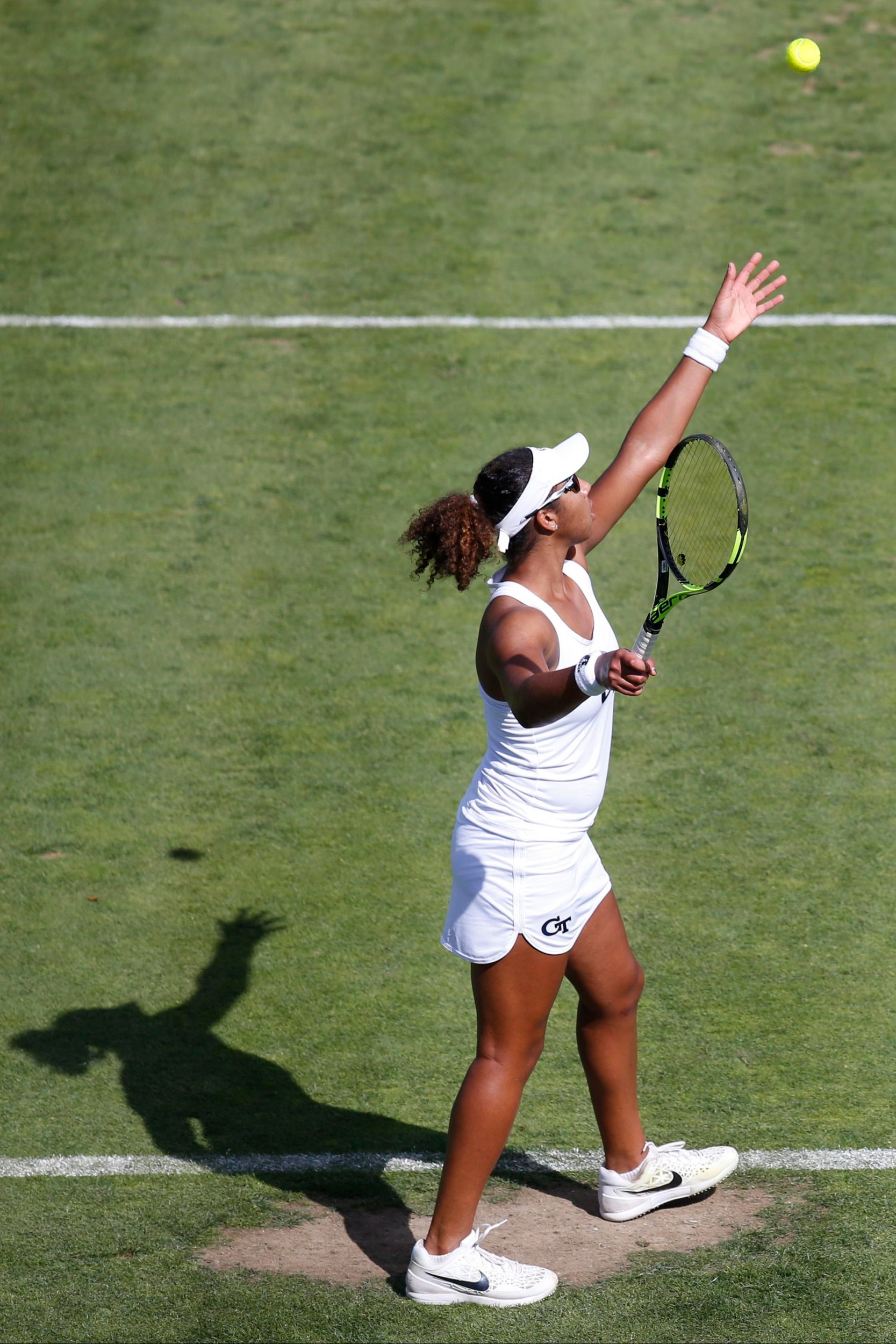 Rasheeda MacAdoo makes a serve during a match at the Hall of Fame Tennis Club. Credit: Greg M. Cooper-USA TODAY Sports