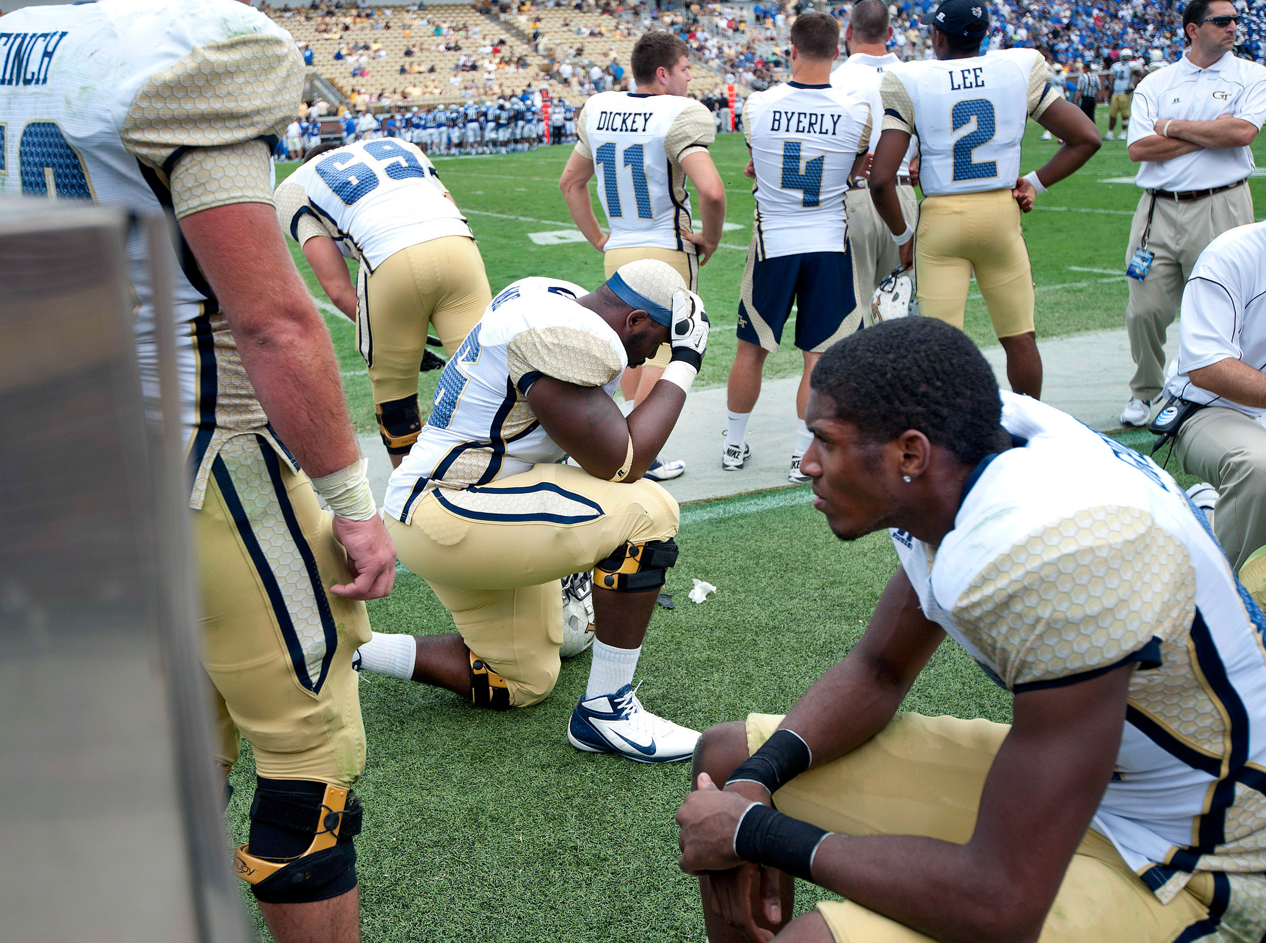 Georgia Tech players react to their loss against Middle Tennessee State in the fourth quarter of an NCAA college football game on Saturday, Sept. 29, 2012, in Atlanta. (AP Photo/Rich Addicks)