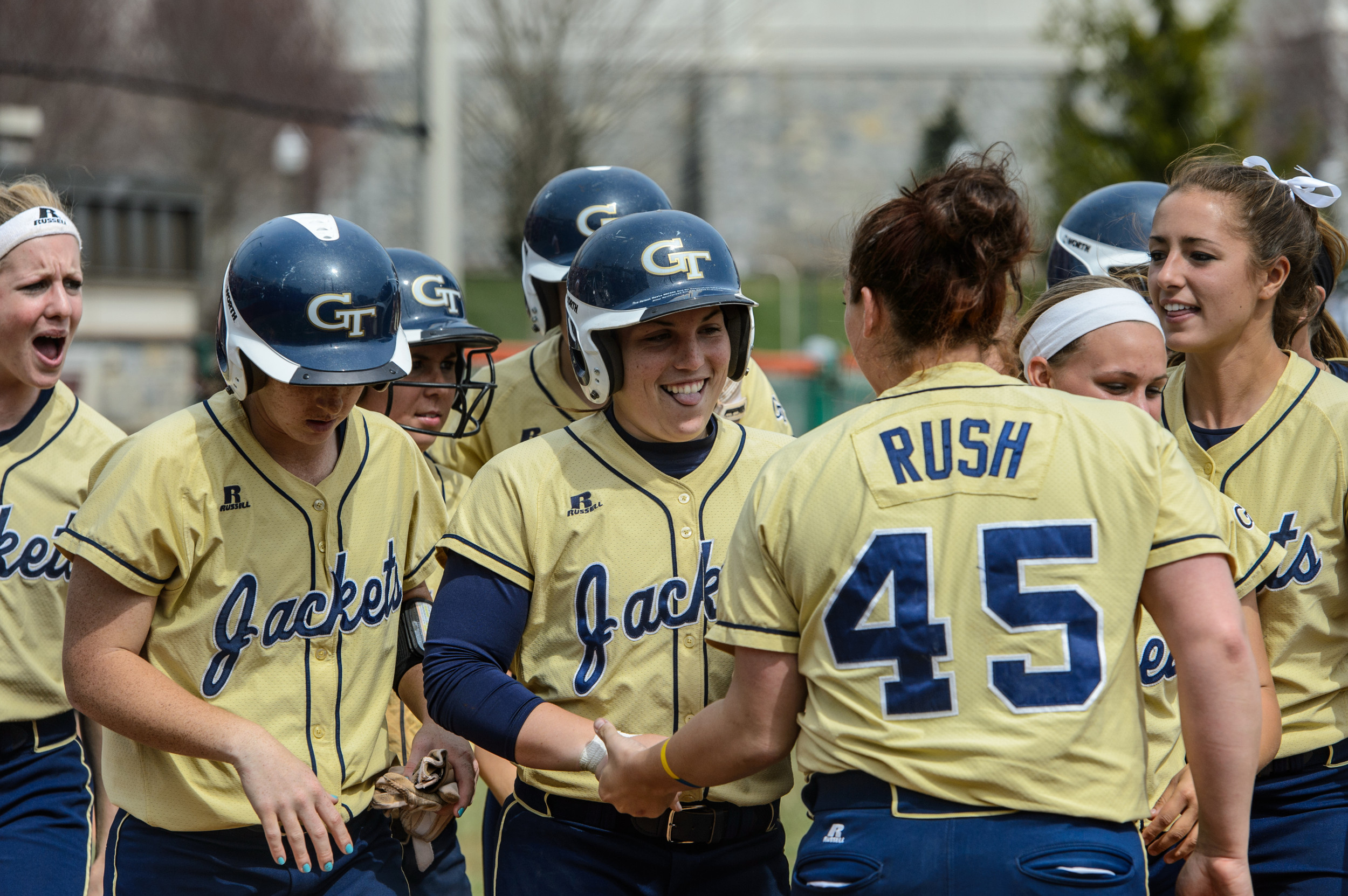 The team celebrates Caitlyn Coffey's home run.