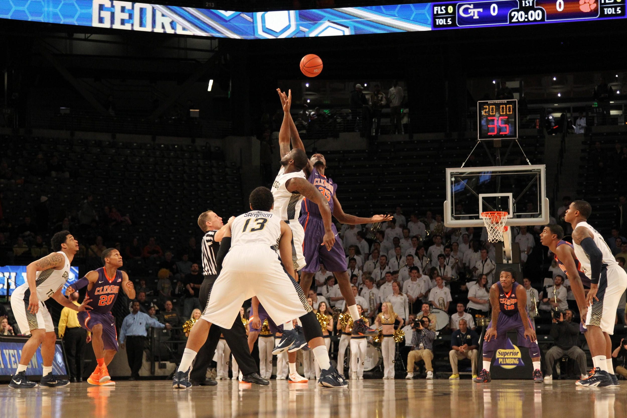 Georgia Tech Yellow Jackets center Demarco Cox (4) and Clemson Tigers center Landry Nnoko (35) compete for the tip off in the first half at McCamish Pavilion. Mandatory Credit: Brett Davis-USA TODAY Sports