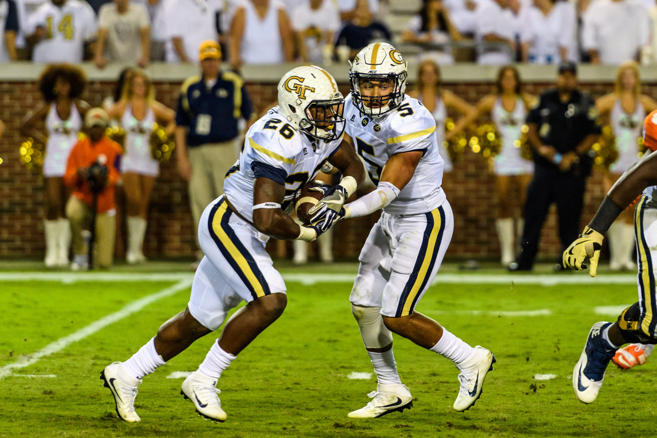 Justin Thomas (5) with the handoff to Dedrick Mills (26) for a rush against No. 5 Clemson on Sept. 22, 2016.