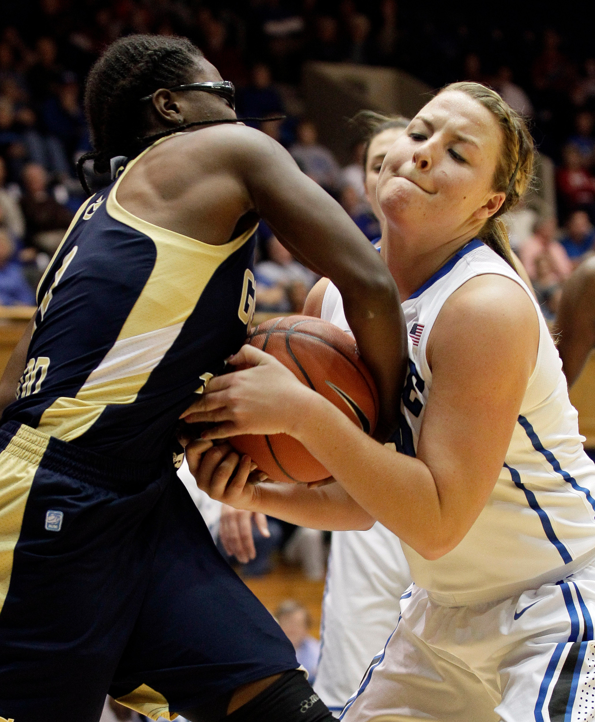 Duke's Tricia Liston, right, and Georgia Tech's Brittany Jackson struggle for possession of the ball during the second half of an NCAA women's college basketball game in Durham, N.C., Thursday, Dec. 6, 2012. Duke won 85-52. (AP Photo/Gerry Broome)