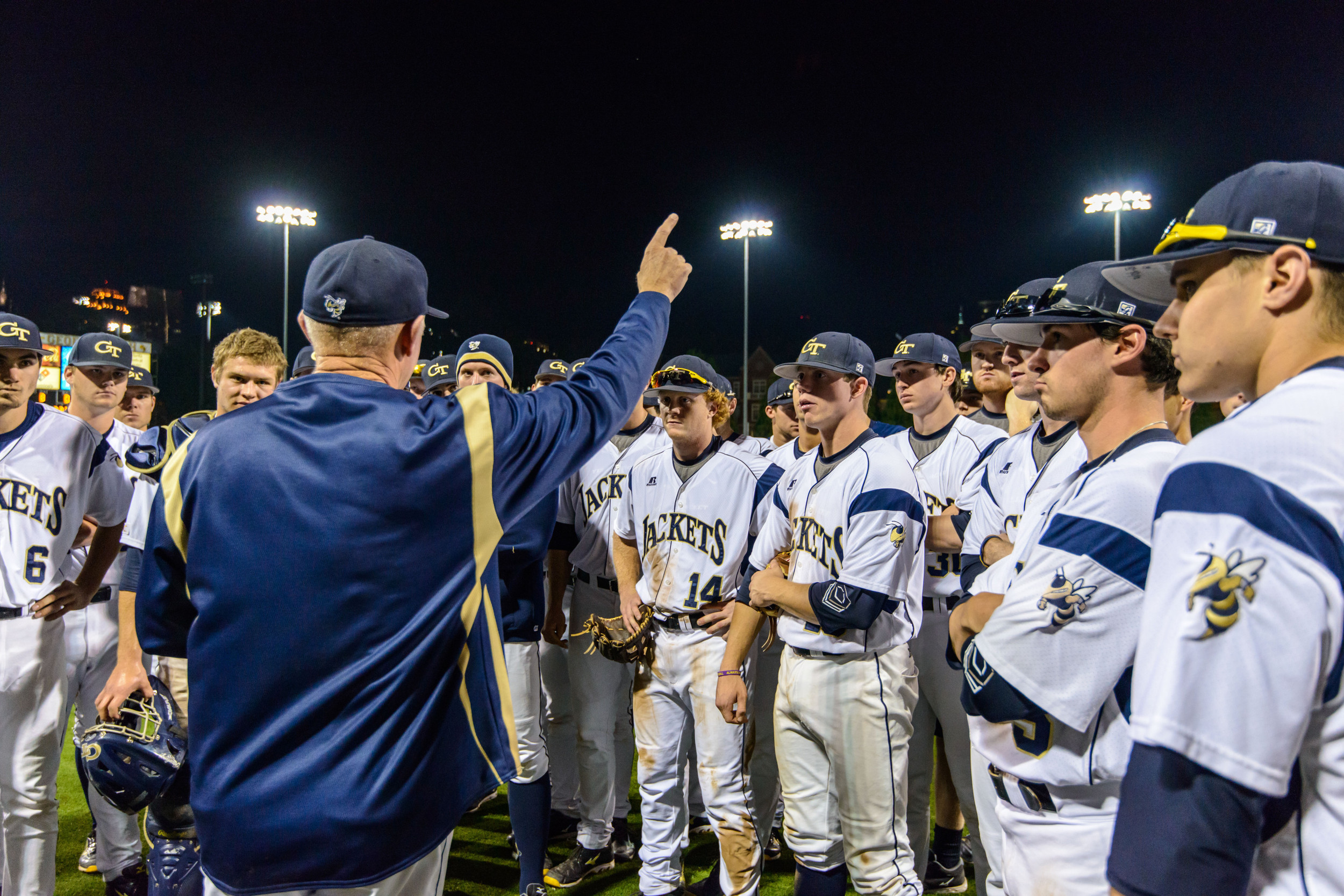 Coach Hall speaks to the team after the win