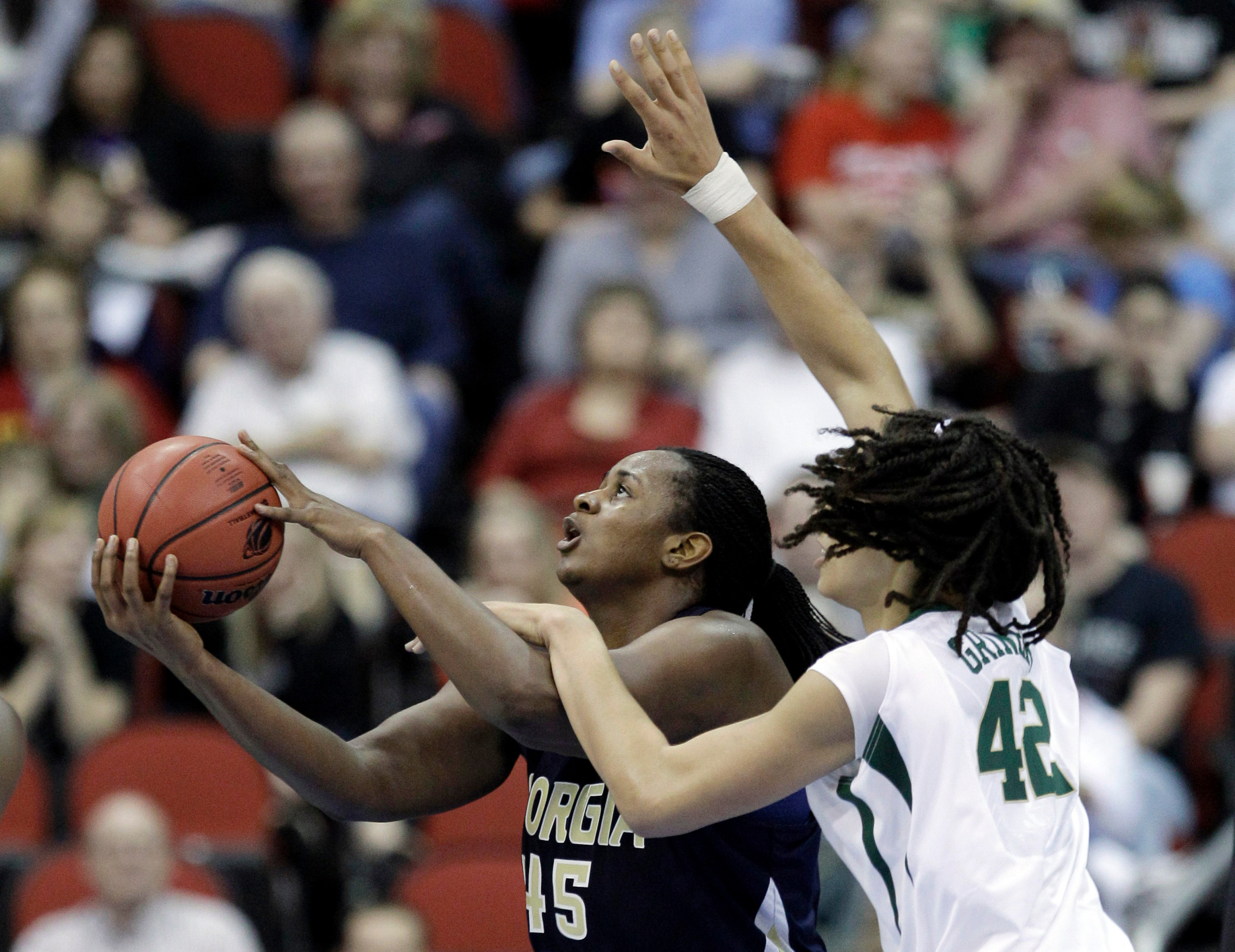 Georgia Tech center Sasha Goodlett shoots in front of Baylor center Brittney Griner, right, during the second half. (AP Photo/Charlie Neibergall)