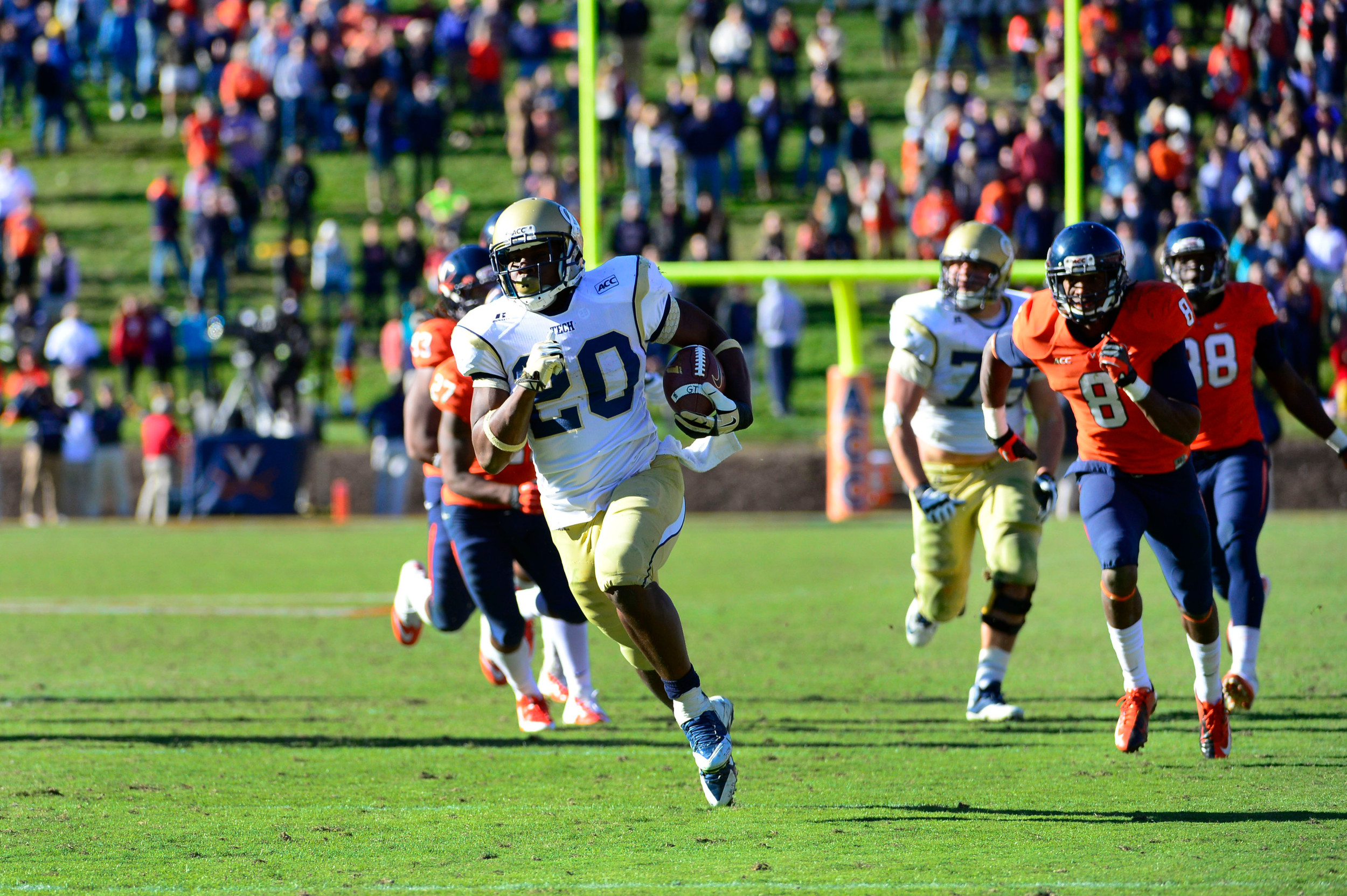 David Sims (20) scores a touchdown with 1:55 left in the fourth quarter as Virginia Cavaliers safety Rijo Walker (27) and safety Anthony Harris (8) and defensive end Max Valles (88) defend. Mandatory Credit: Bob Donnan-USA TODAY Sports