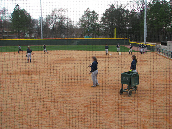 Softball team practices in its new stadium for the first time.