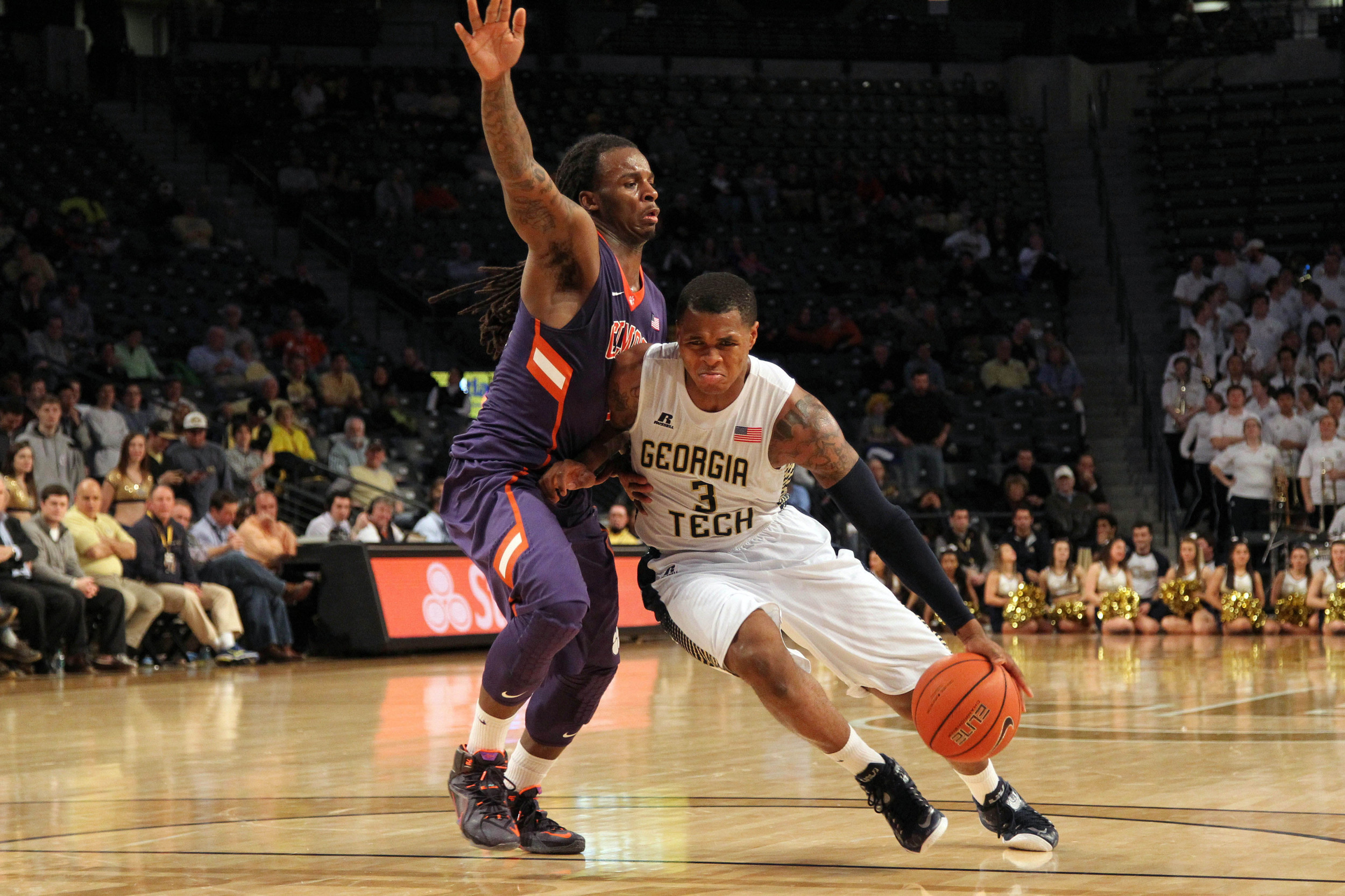Georgia Tech Yellow Jackets forward Marcus Georges-Hunt (3) is defended by Clemson Tigers guard Rod Hall (12) in the second half at McCamish Pavilion. Georgia Tech defeated Clemson 63-52. Mandatory Credit: Brett Davis-USA TODAY Sports