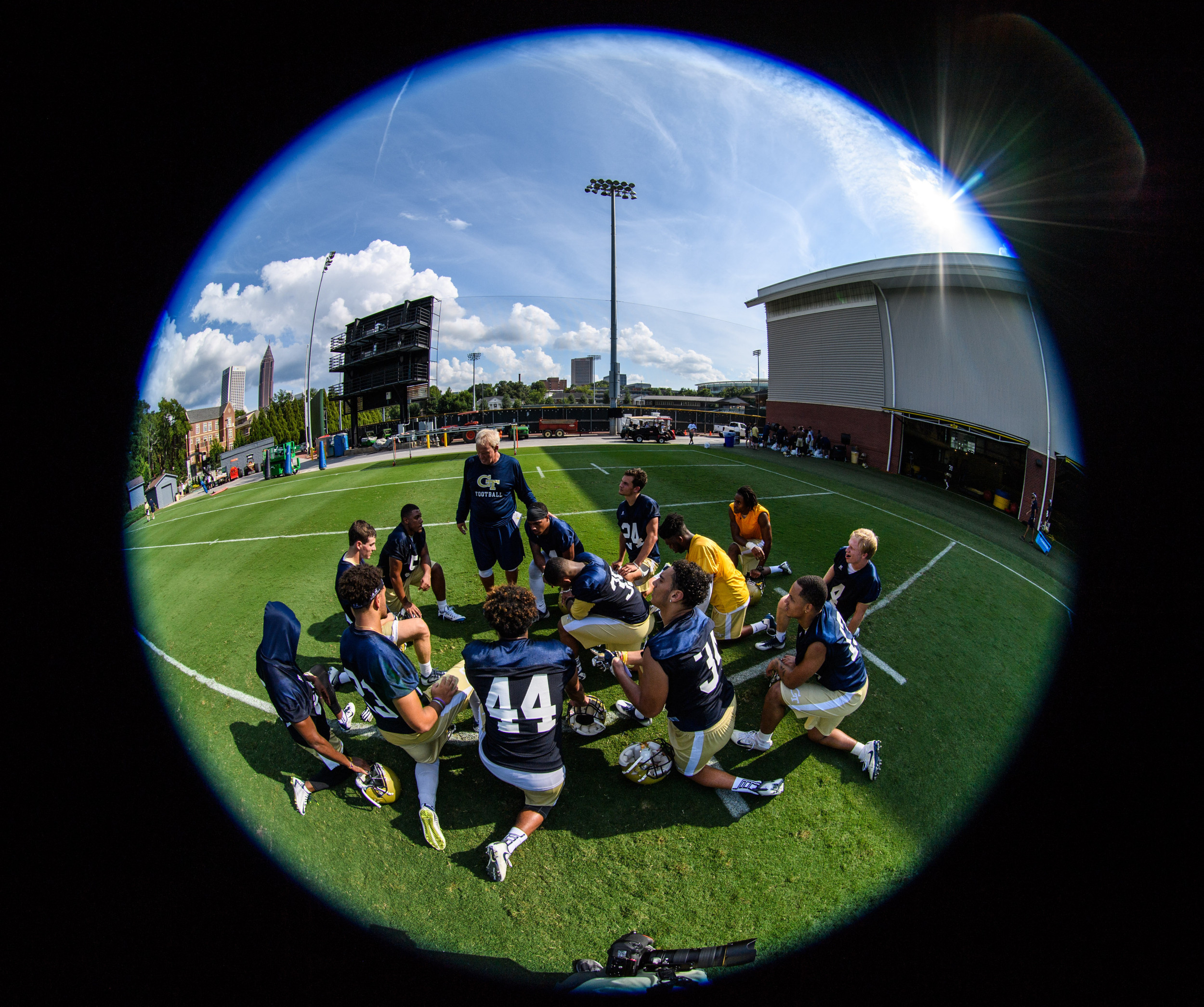 Assistant Coach Andy McCollum talks to the safeties after practice