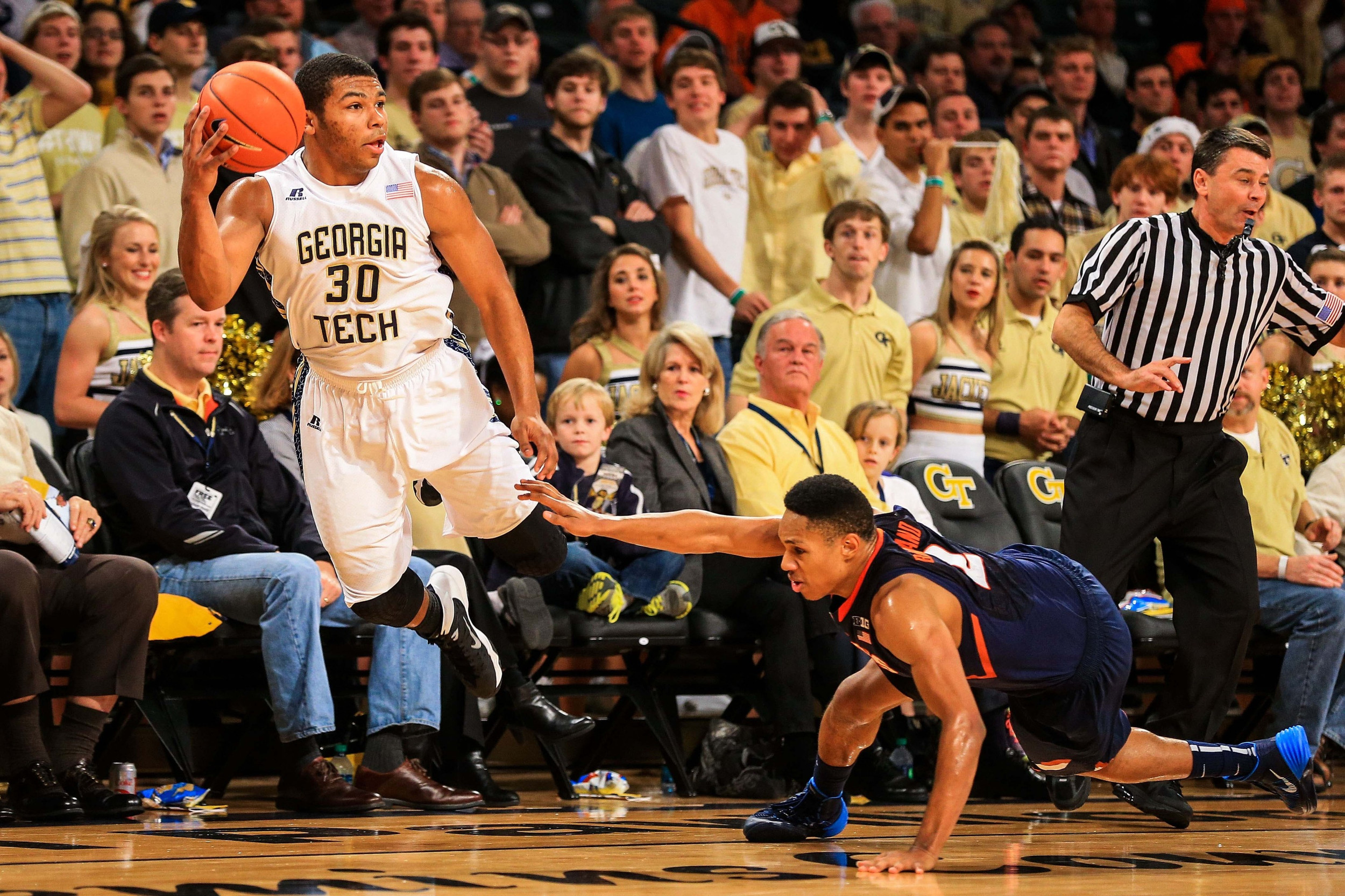 Corey Heyward (30) and Illinois Fighting Illini guard Joseph Bertrand (2) attempt to keep a ball in bounds. (Daniel Shirey-USA TODAY Sports)