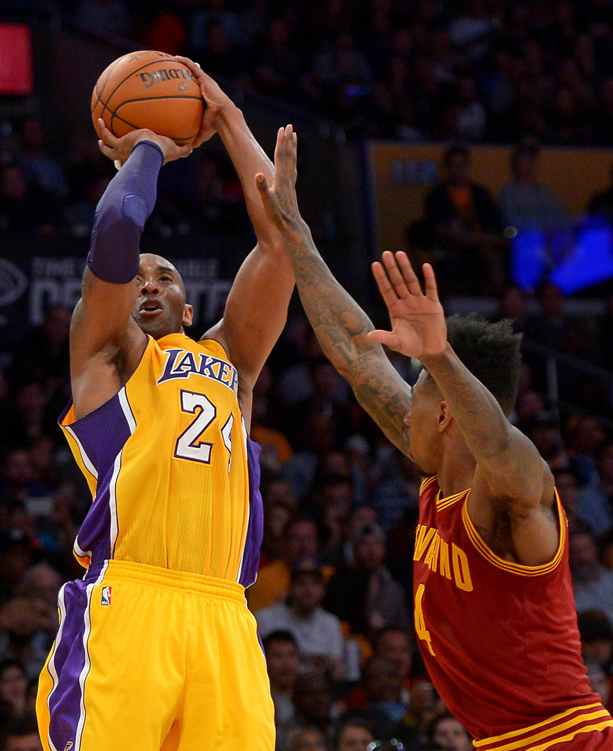 Mar 10, 2016; Los Angeles, CA, USA; Cleveland Cavaliers guard Iman Shumpert (4) defends Los Angeles Lakers forward Kobe Bryant (24). Credit: Jayne Kamin-Oncea-USA TODAY Sports
