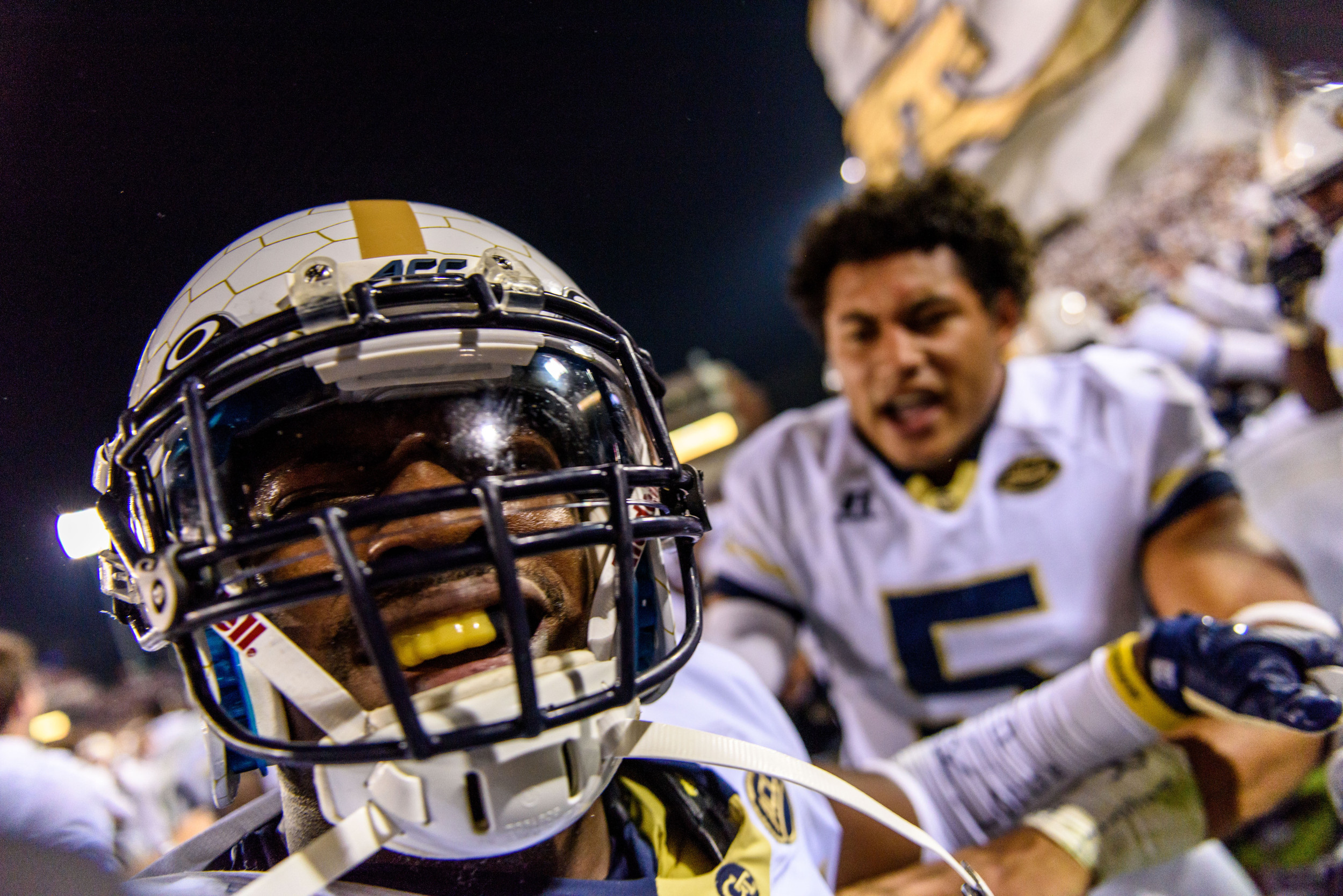 Lance Austin (17) celebrates his game-winning TD in the endzone as Justin Thomas (5) looks on