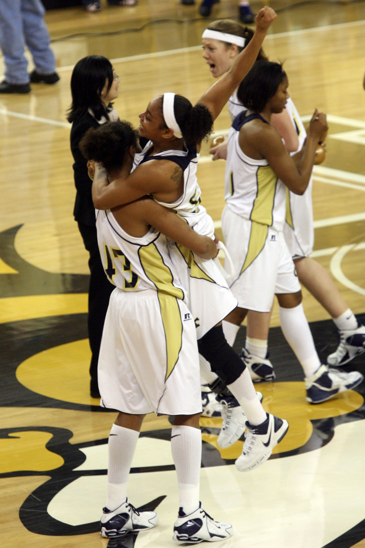 Georgia Tech's Chioma Nnamaka, bottom, lifts teammate Jill Ingram after Georgia Tech defeated No. 4 Maryland, 77-72, in their college basketball game Thursday, Feb. 1, 2007, in Atlanta. (AP Photo/The Journal & Constitution, Mikki K. Harris)