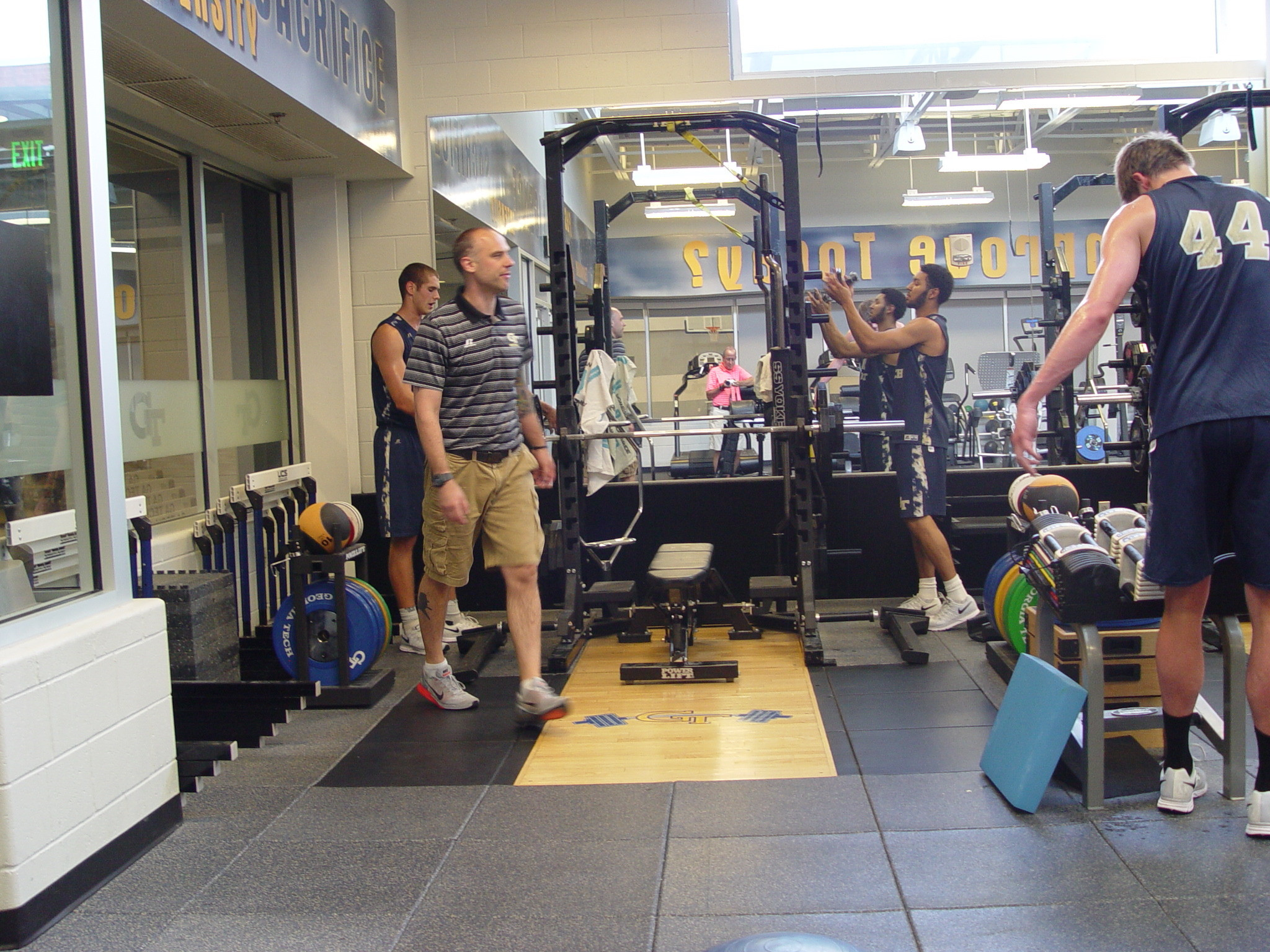 Player development coach Dan Taylor takes the Georgia Tech men's basketball team through a workout on June 16, 2016 in the Zelnak Center weight room.