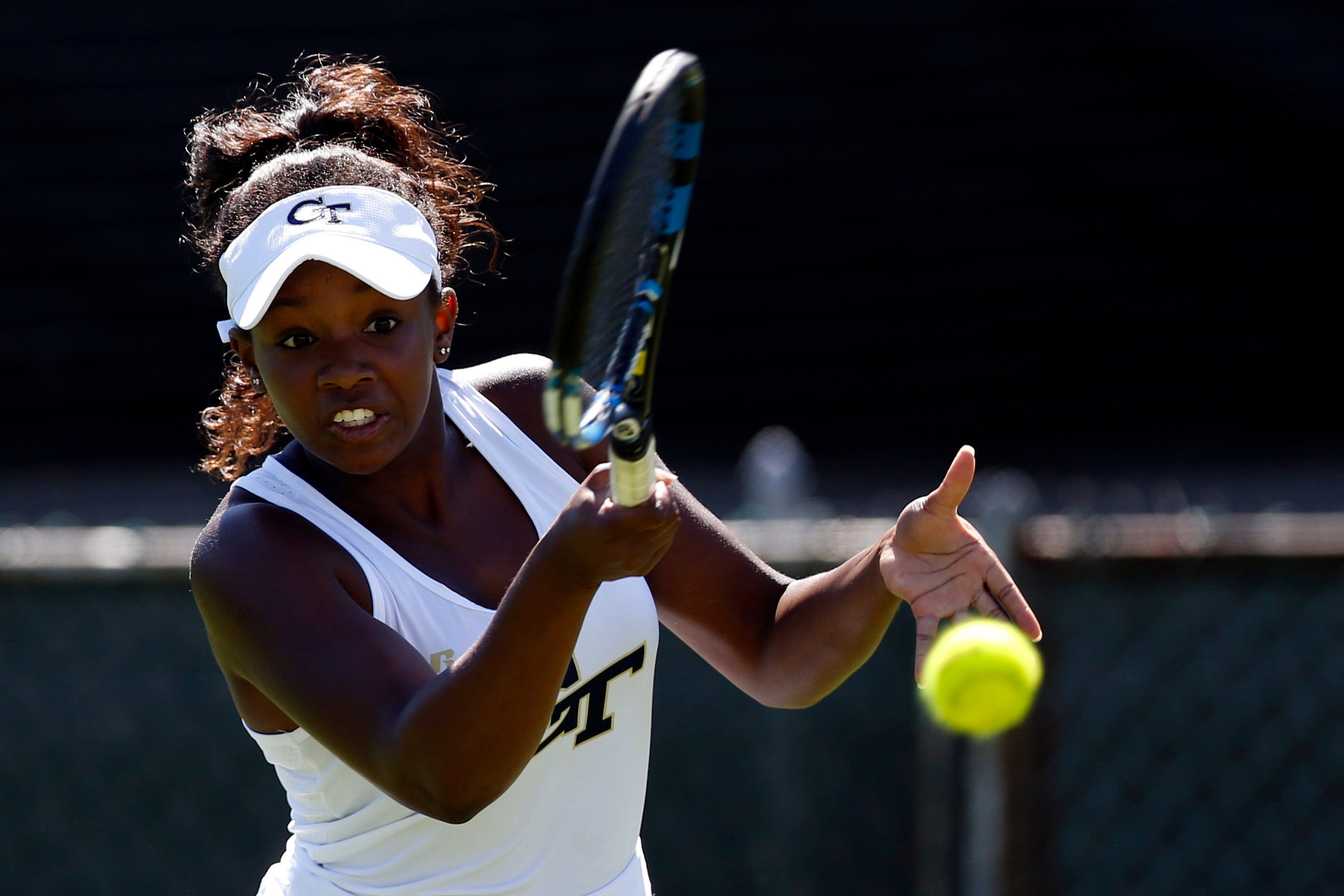 Kenya Jones makes a return during a match at the Hall of Fame Tennis Club. Credit: Greg M. Cooper-USA TODAY Sports