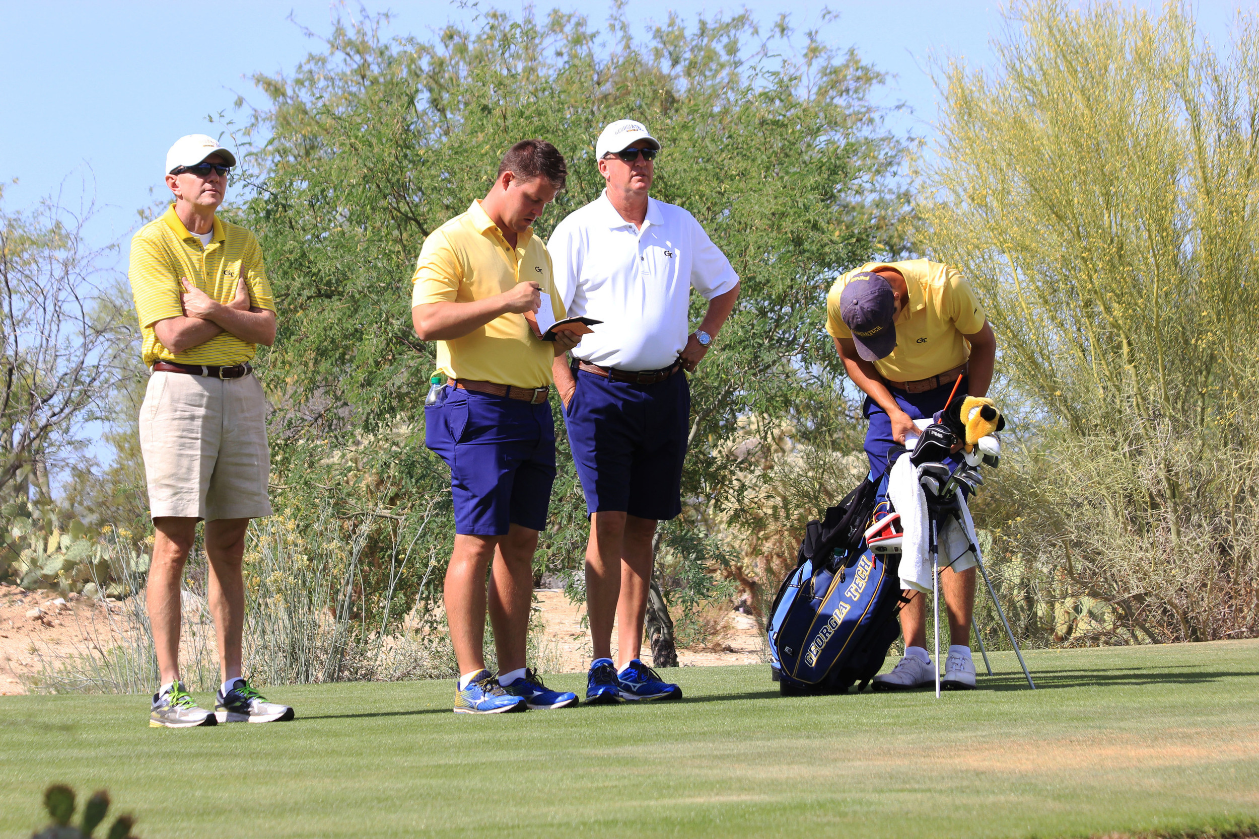 Assistant coach Jeff Pierce and head coach Bruce Heppler during the second round of the NCAA Tucson Golf Regional, Gallery Golf Club, Marana, Ariz.