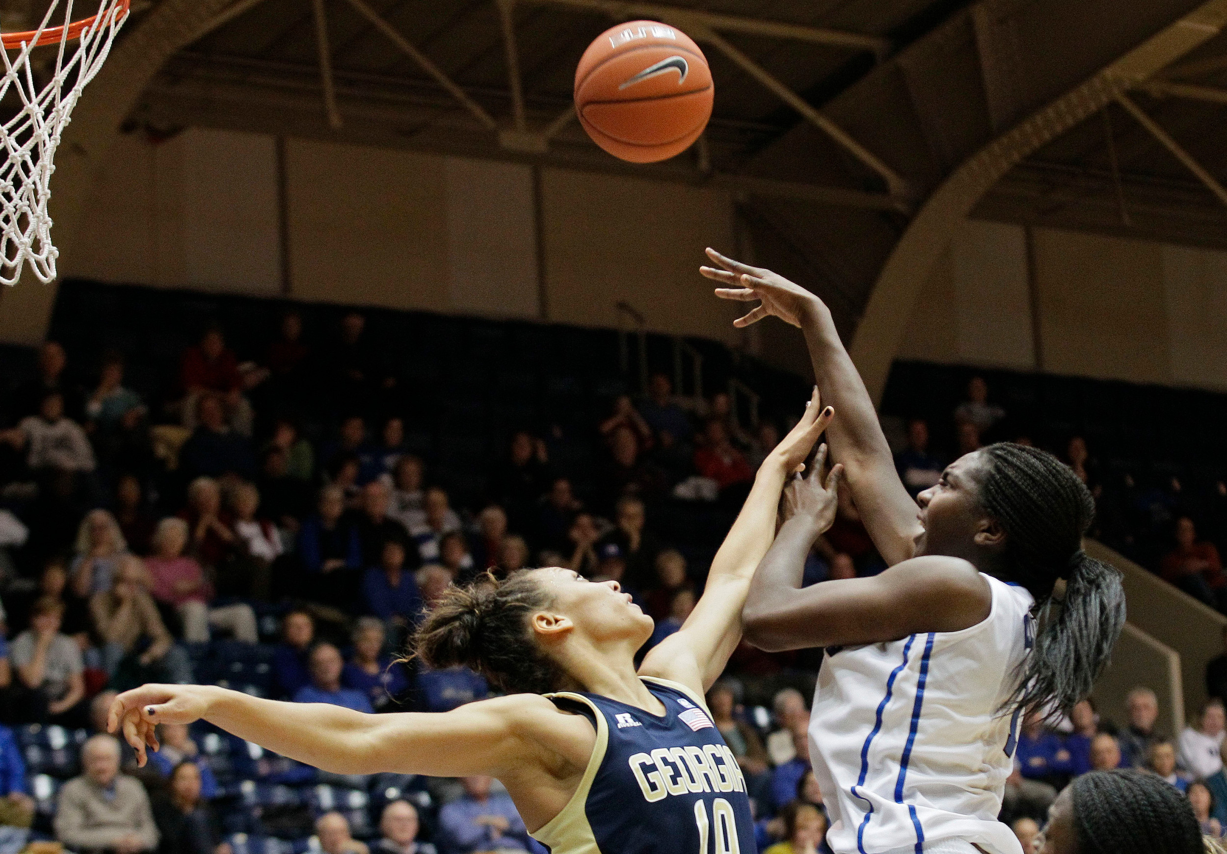 Duke's Elizabeth Williams shoots over Georgia Tech's Danielle Hamilton-Carter (10) during the second half of an NCAA college basketball game in Durham, N.C., Thursday, Dec. 6, 2012. Duke won 85-52. (AP Photo/Gerry Broome)