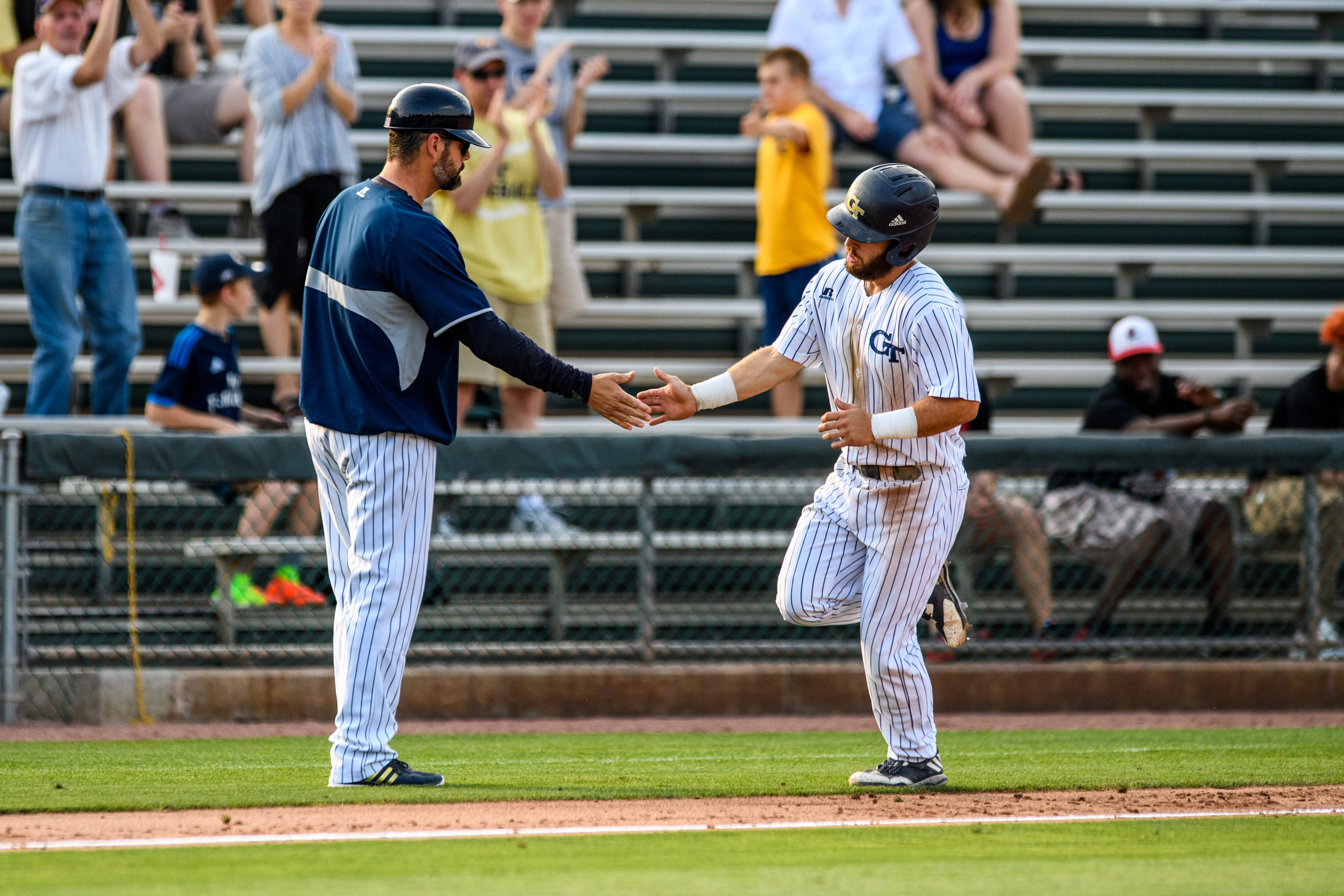 Wade Bailey (3), Assistant Coach Bryan Prince (18)