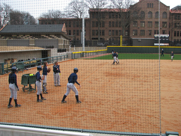 Softball team practices in its new stadium for the first time.