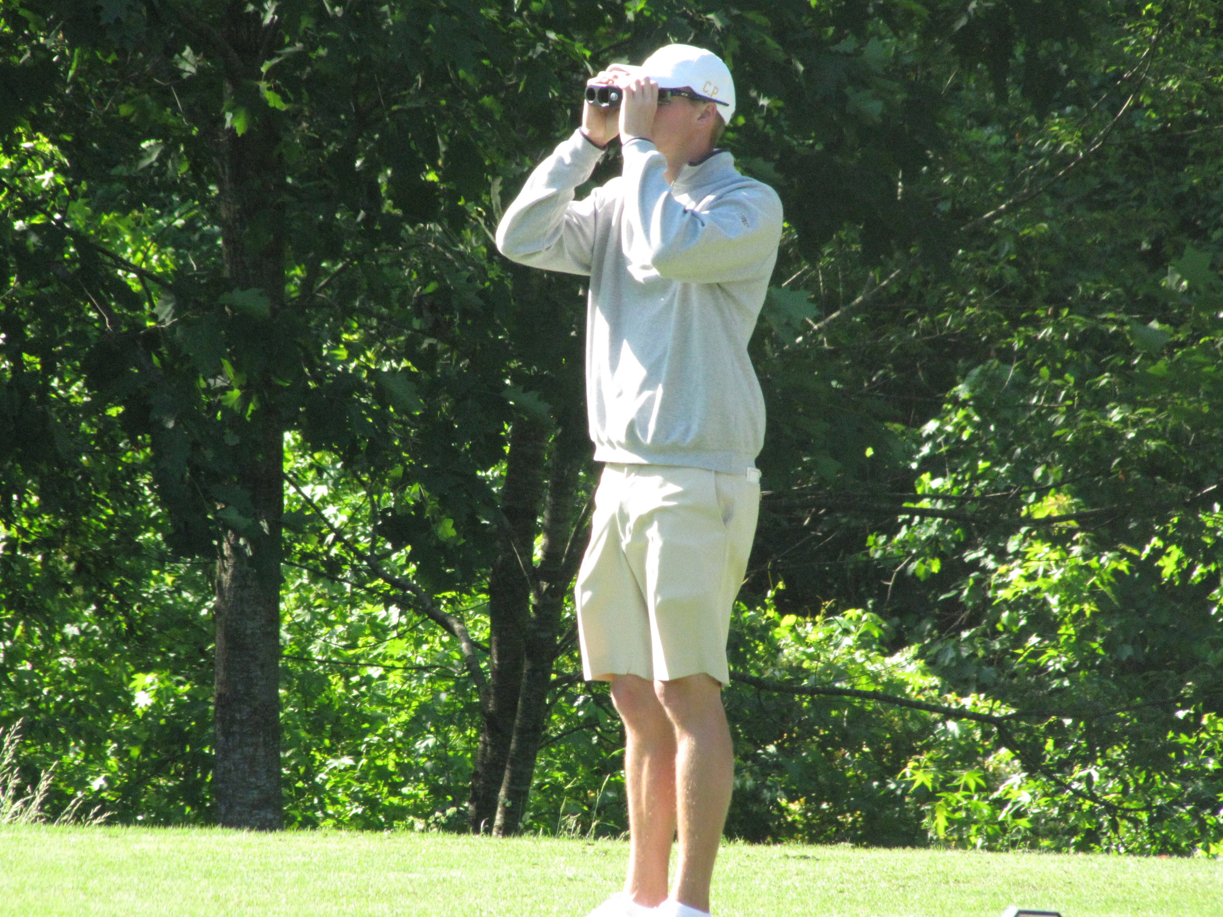 Richy Werenski checks the distance from the 2nd tee during the final round of the NCAA Raleigh Regional.