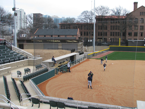 Softball team practices in its new stadium for the first time.