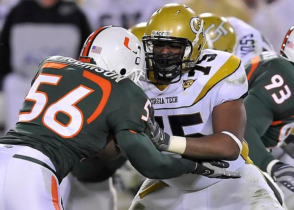 Nick Claytor (75) blocks Miami LB Marcus Robinson. (Photo by LensEffects)