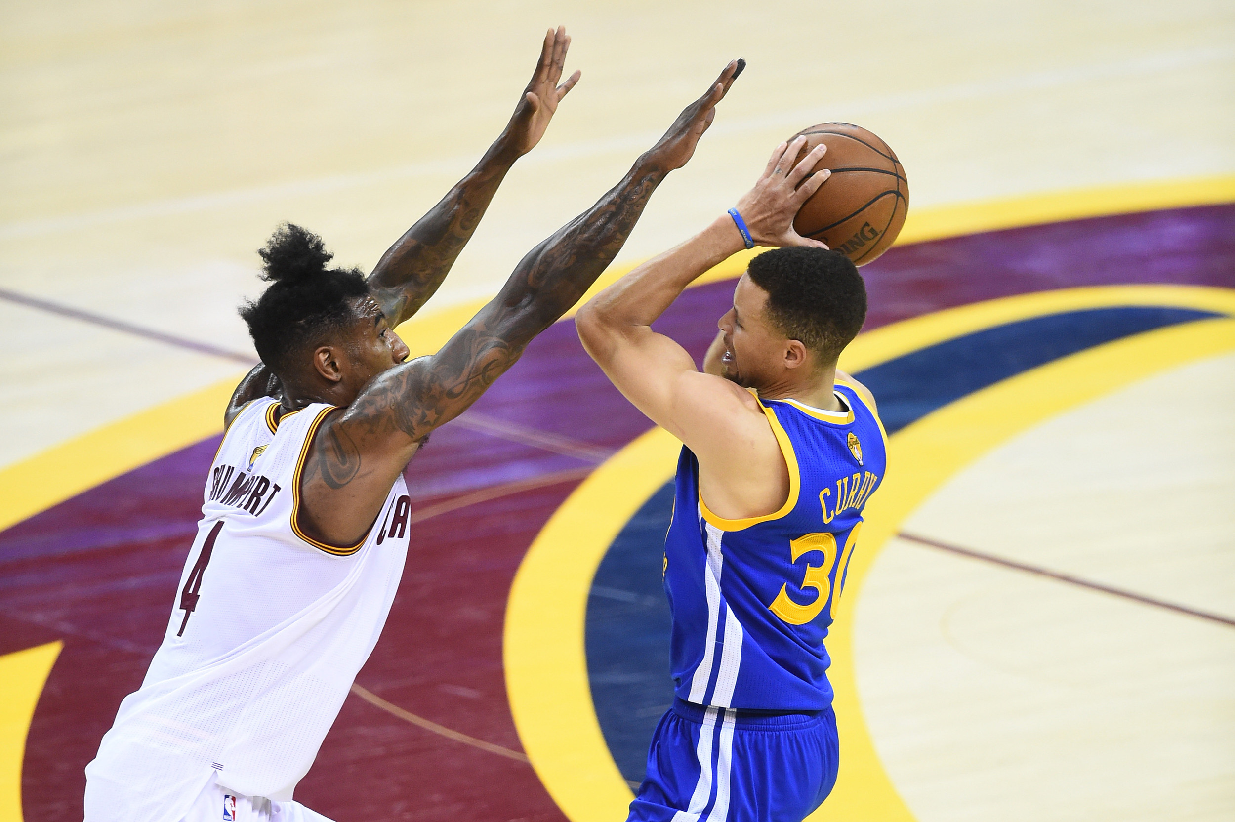 Jun 8, 2016; Cleveland, OH, USA; Cleveland Cavaliers guard Iman Shumpert (4) defends Golden State Warriors guard Stephen Curry (30) during game three of the NBA Finals. The Cavaliers won 120-90. Credit: David Richard-USA TODAY Sports