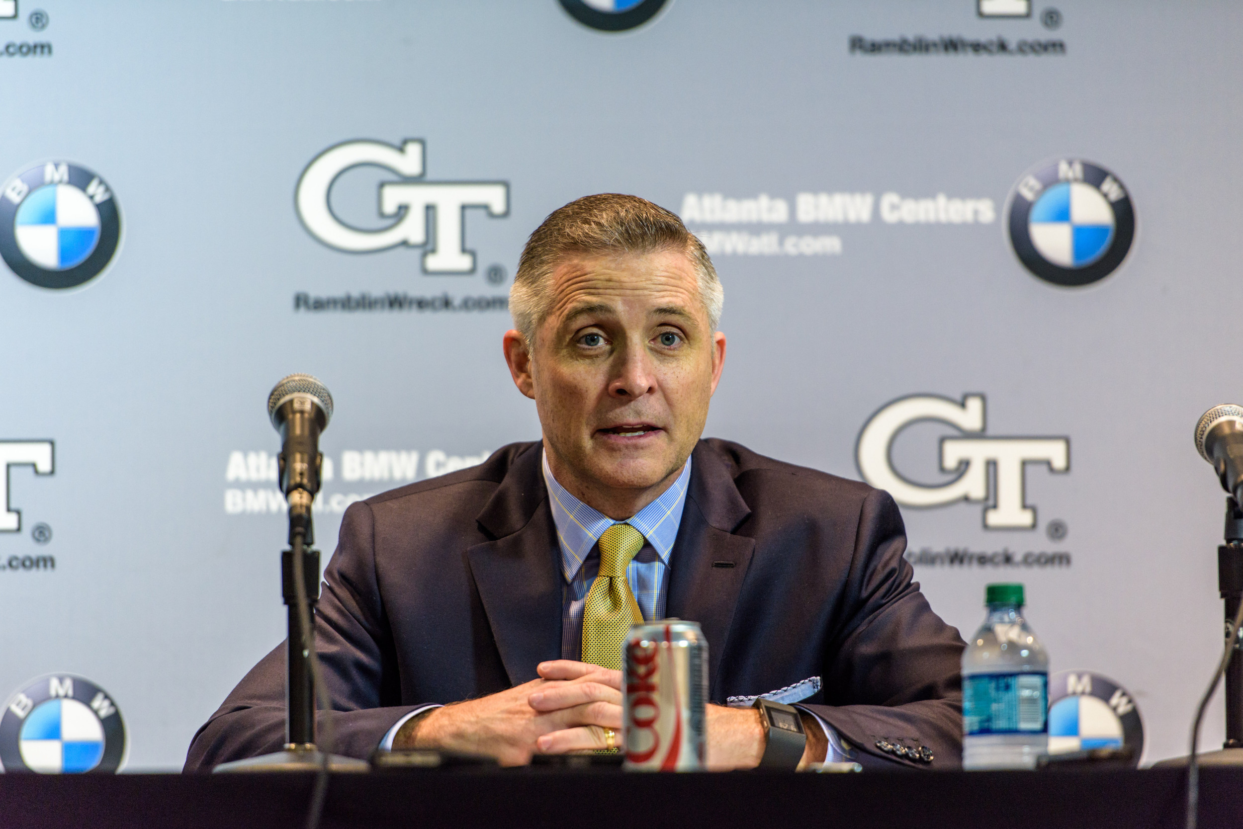 Coach Brian Gregory talks to the media in the postgame press conference