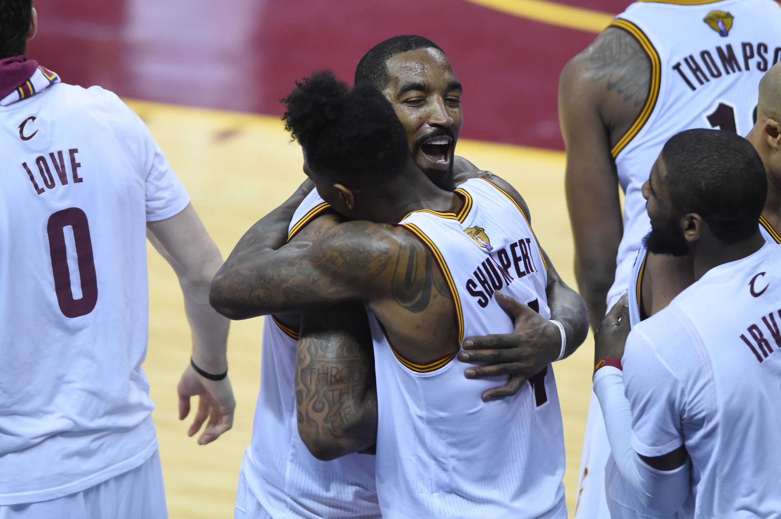 Jun 16, 2016; Cleveland, OH, USA; Cleveland Cavaliers guard J.R. Smith (5) celebrates with guard Iman Shumpert (4) after defeating the Golden State Warriors 115-101 in game six of the NBA Finals. Credit: Ken Blaze-USA TODAY Sports